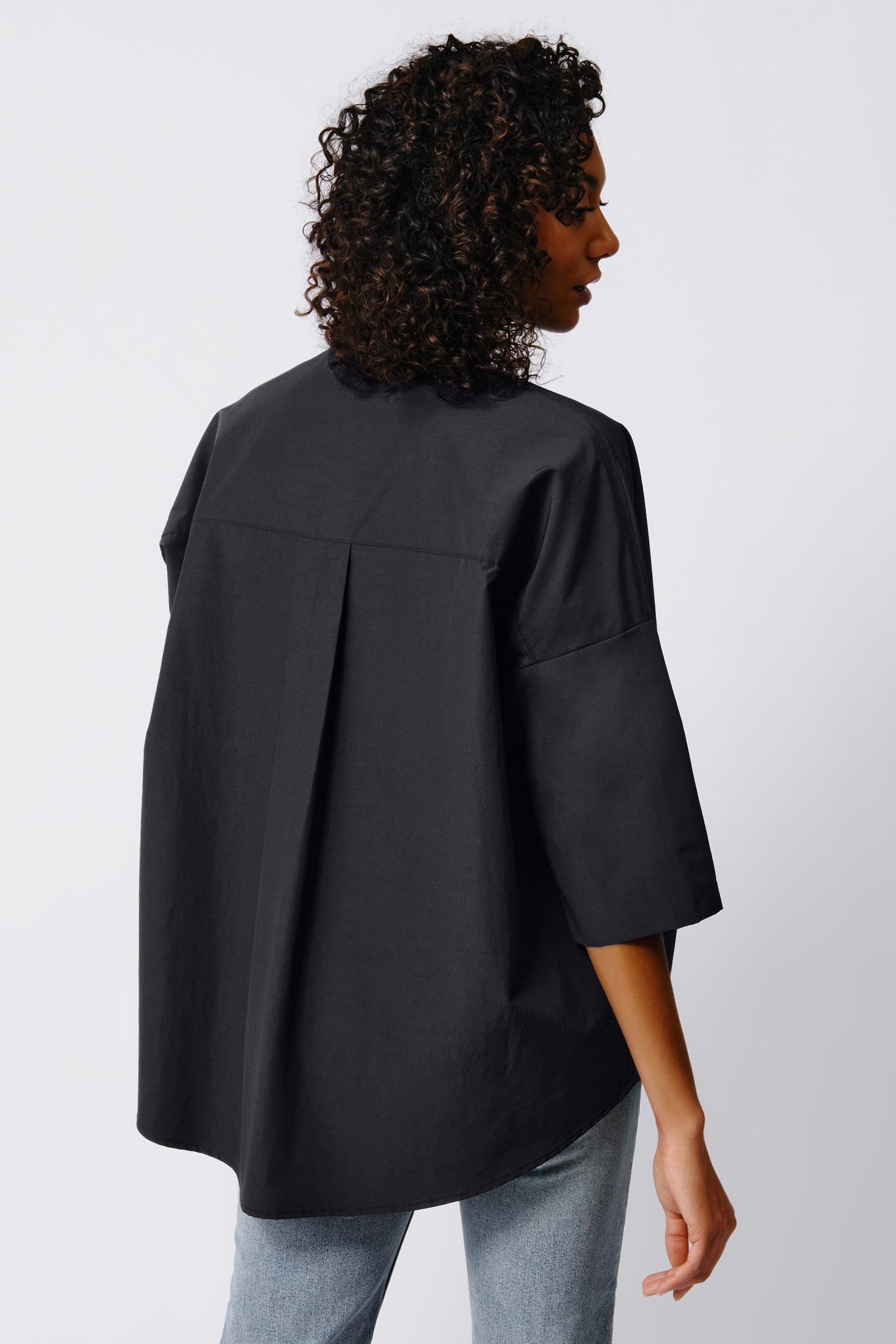 Kal Rieman Pleat Hem Kimono in Black Broadcloth on Model Front View Crop
