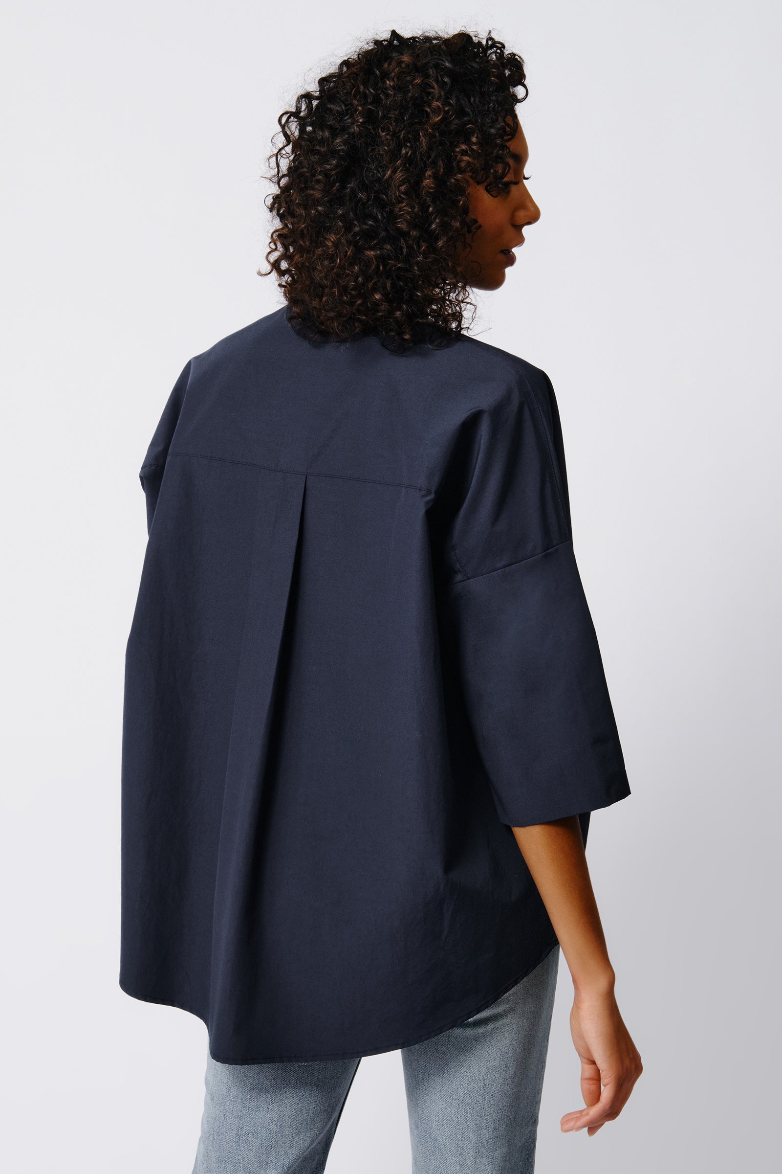 Kal Rieman Pleat Hem Kimono in Navy Broadcloth on Model Back View Crop