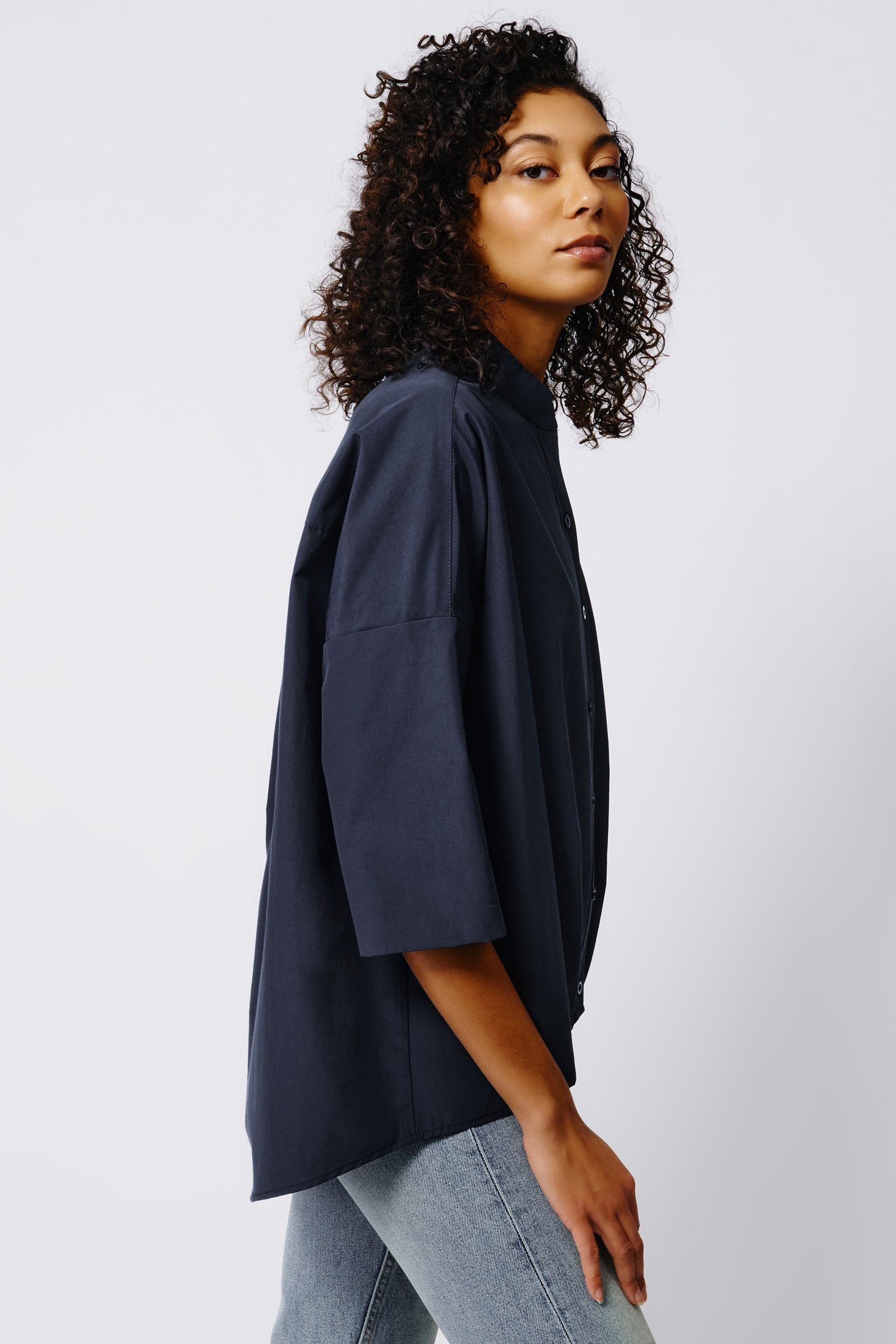 Kal Rieman Pleat Hem Kimono in Navy Broadcloth on Model Side View Crop