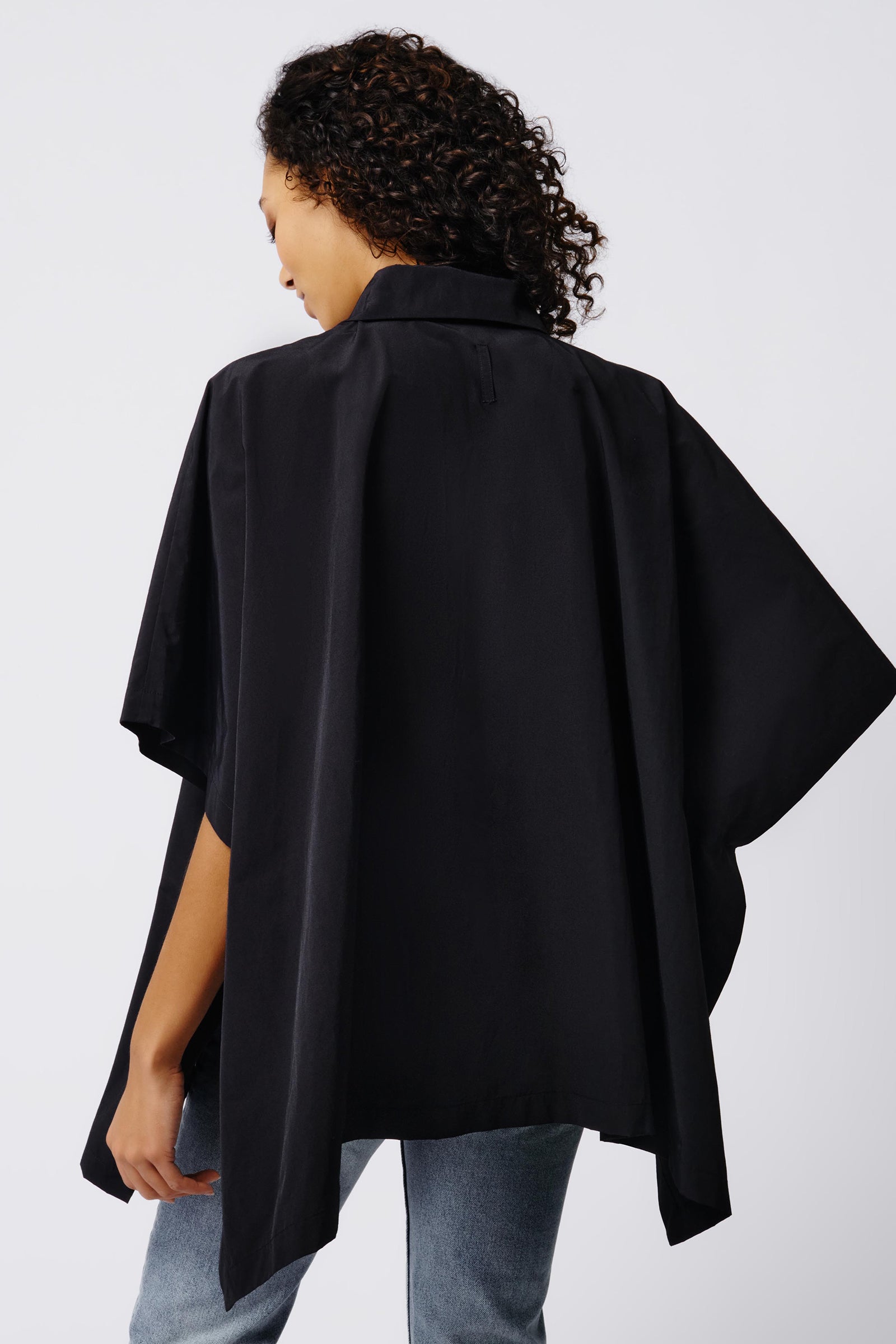Kal Rieman Gene Pocket Poncho in Black on Model Back View Crop