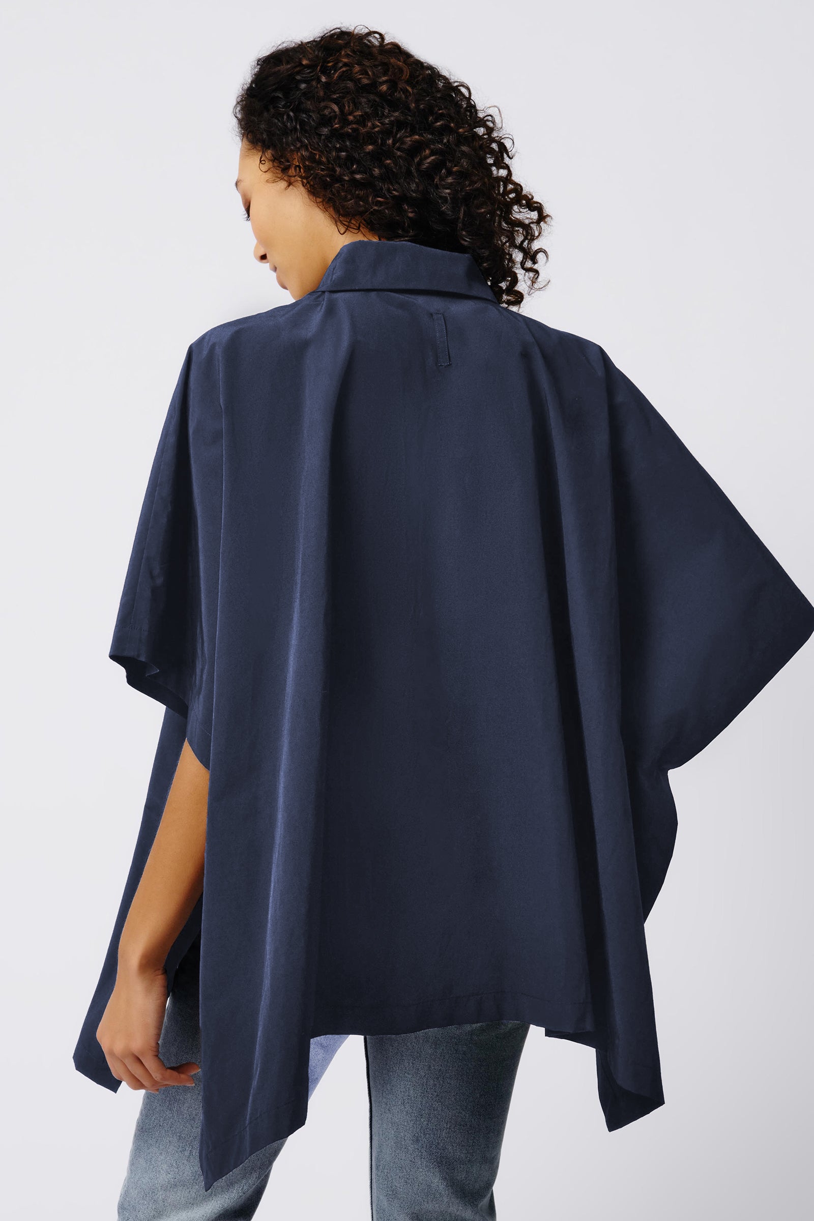 Kal Rieman Gene Pocket Poncho in Navy on Model Back View Crop