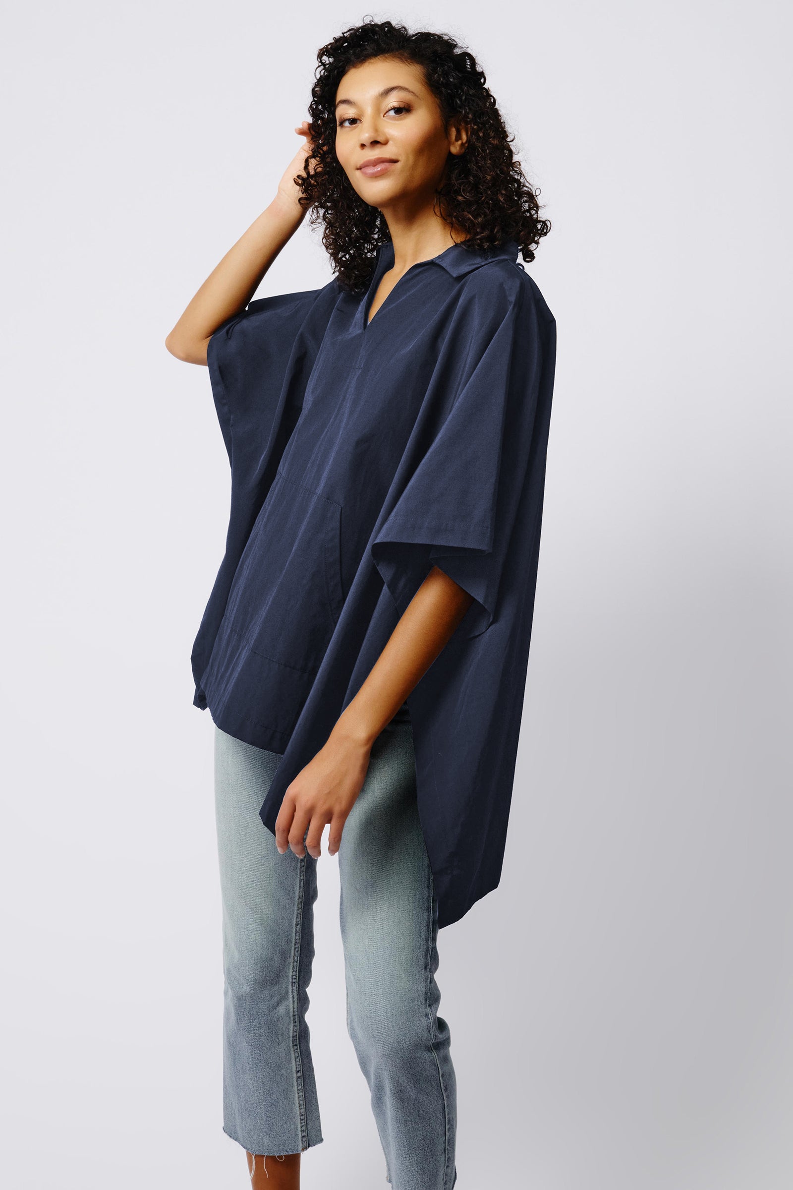 Kal Rieman Gene Pocket Poncho in Navy on Model Side View Crop