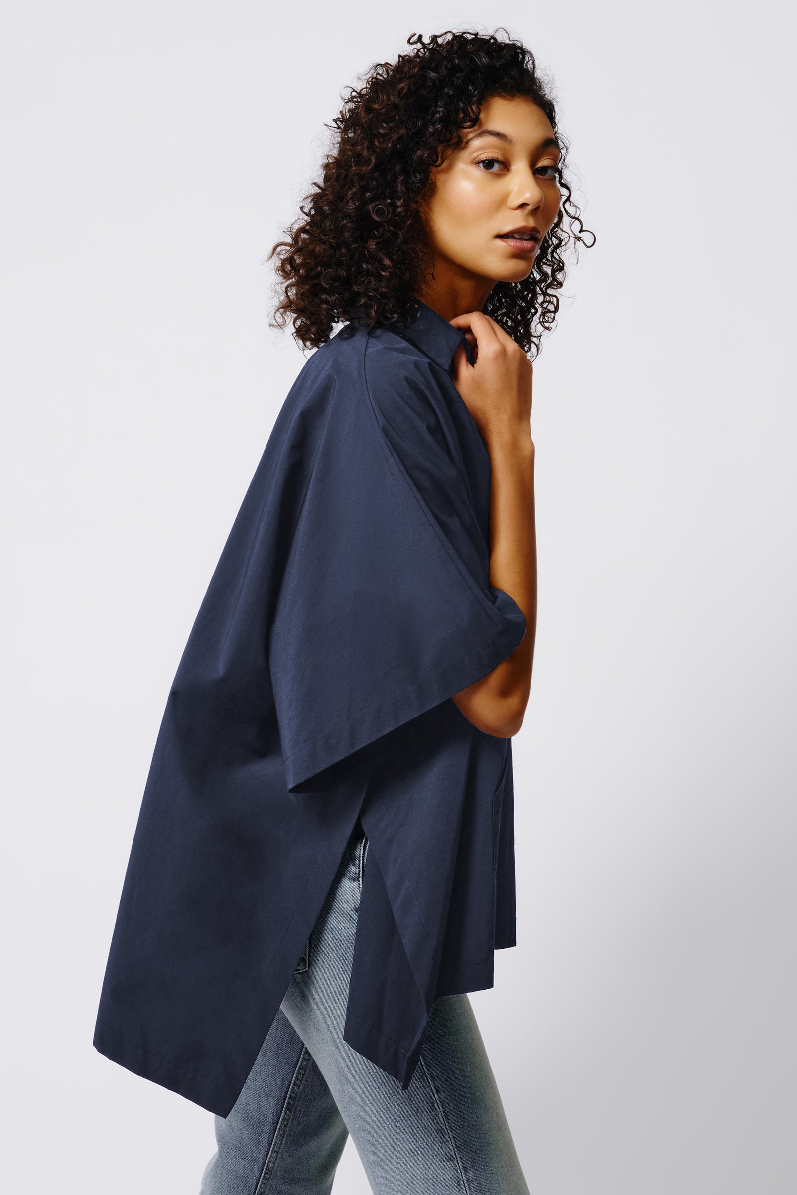 Kal Rieman Gene Pocket Poncho in Navy on Model Side View Crop 2