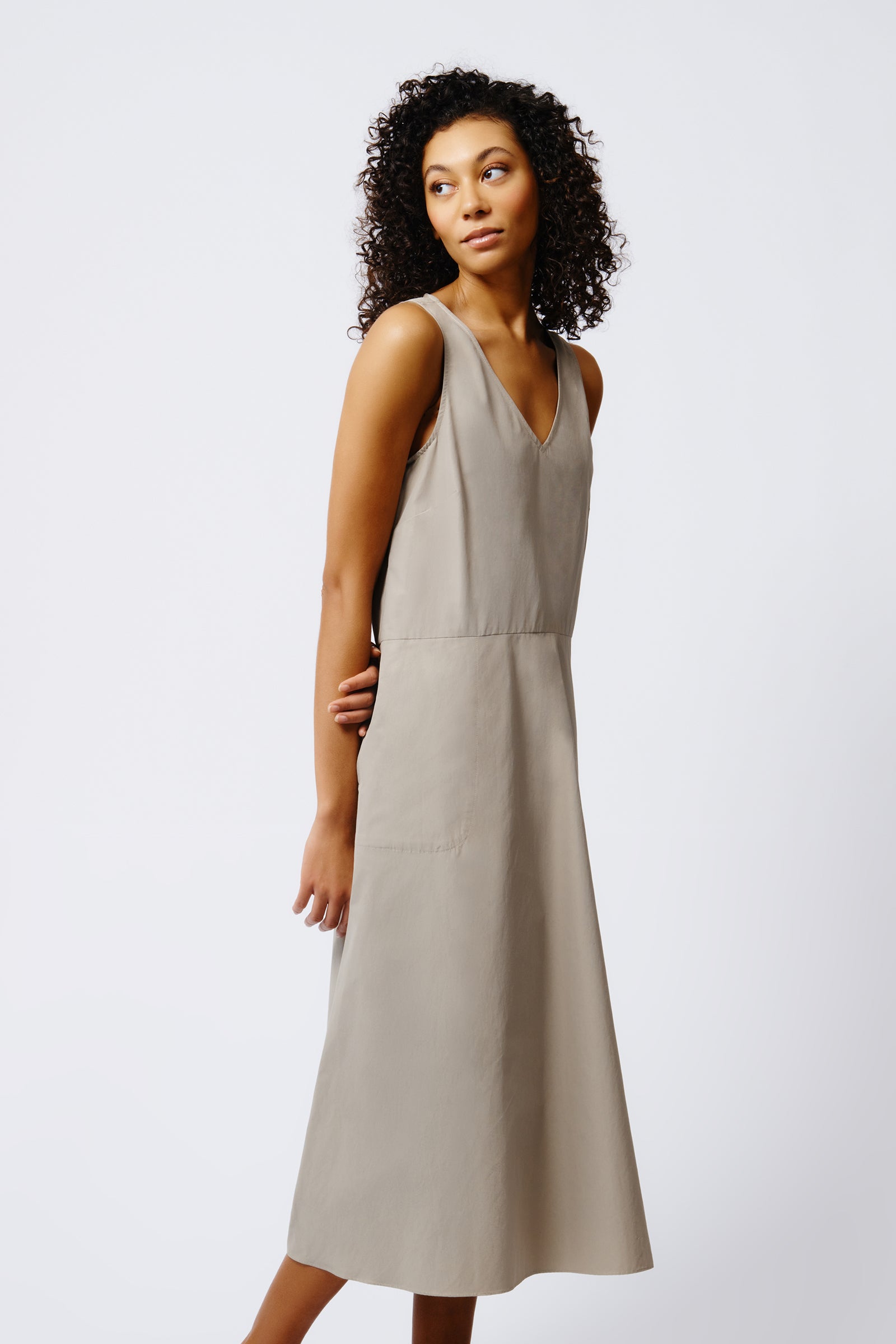 Kal Rieman V Neck Flounce Dress in Military Khaki on Model Side View Crop