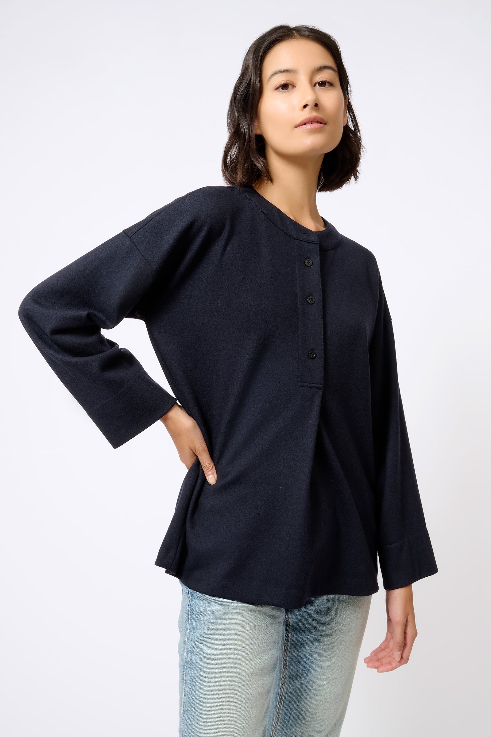 Kal Rieman Band Collar Top in Midnight on Model with Hand on Hip Front View