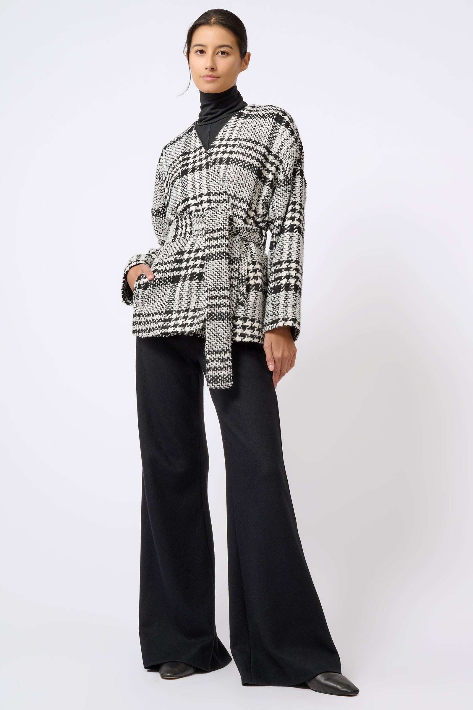 Kal Rieman Belted Cardigan in Black and White Plaid on Model with Hand in Pocket Full Front View