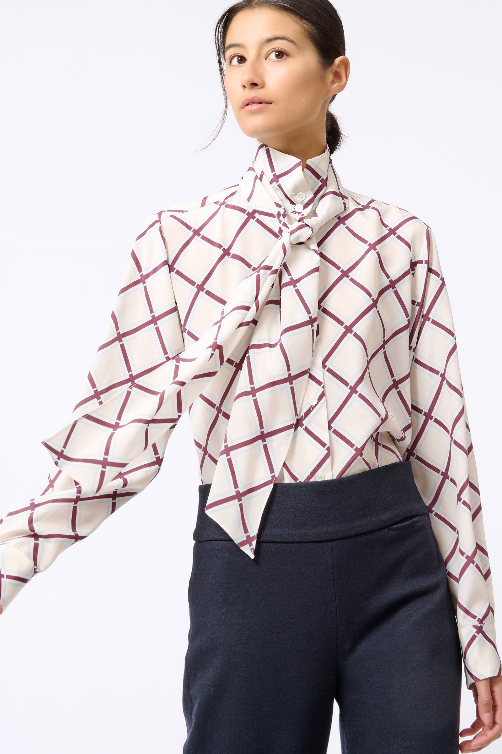 Kal Rieman Scarf Tie Blouse in Diagonal Print on Model with Arm Out Front View