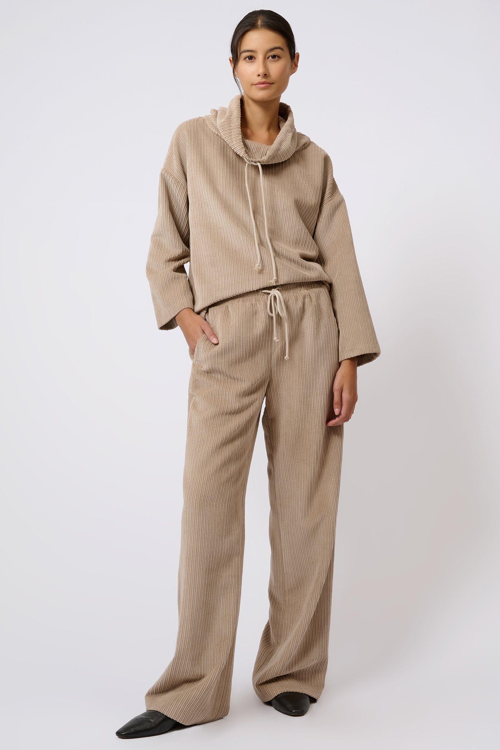 Kal Rieman Debbie Drawstring Pant in Beige on Model with Hand in Pocket Full Front View