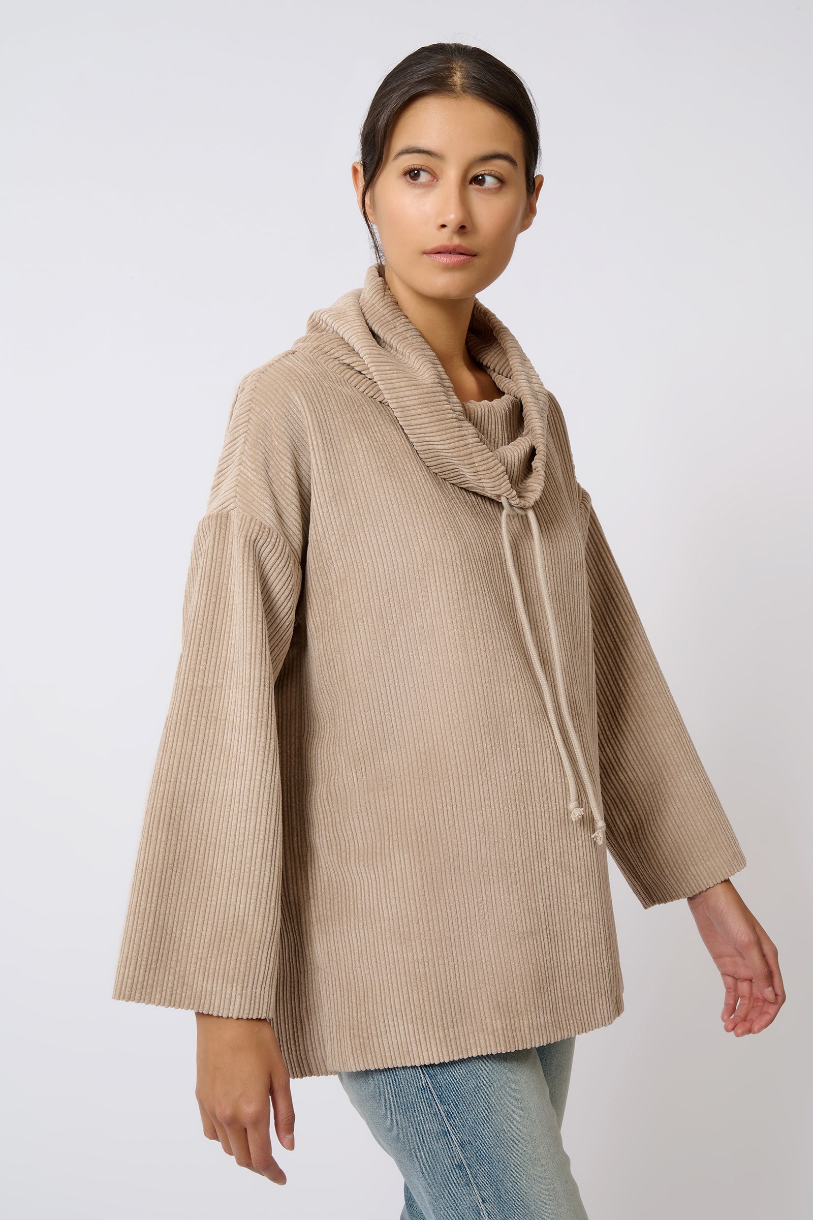 Kal Rieman Debbie Drawstring Pullover in Beige on Model Walking Side View
