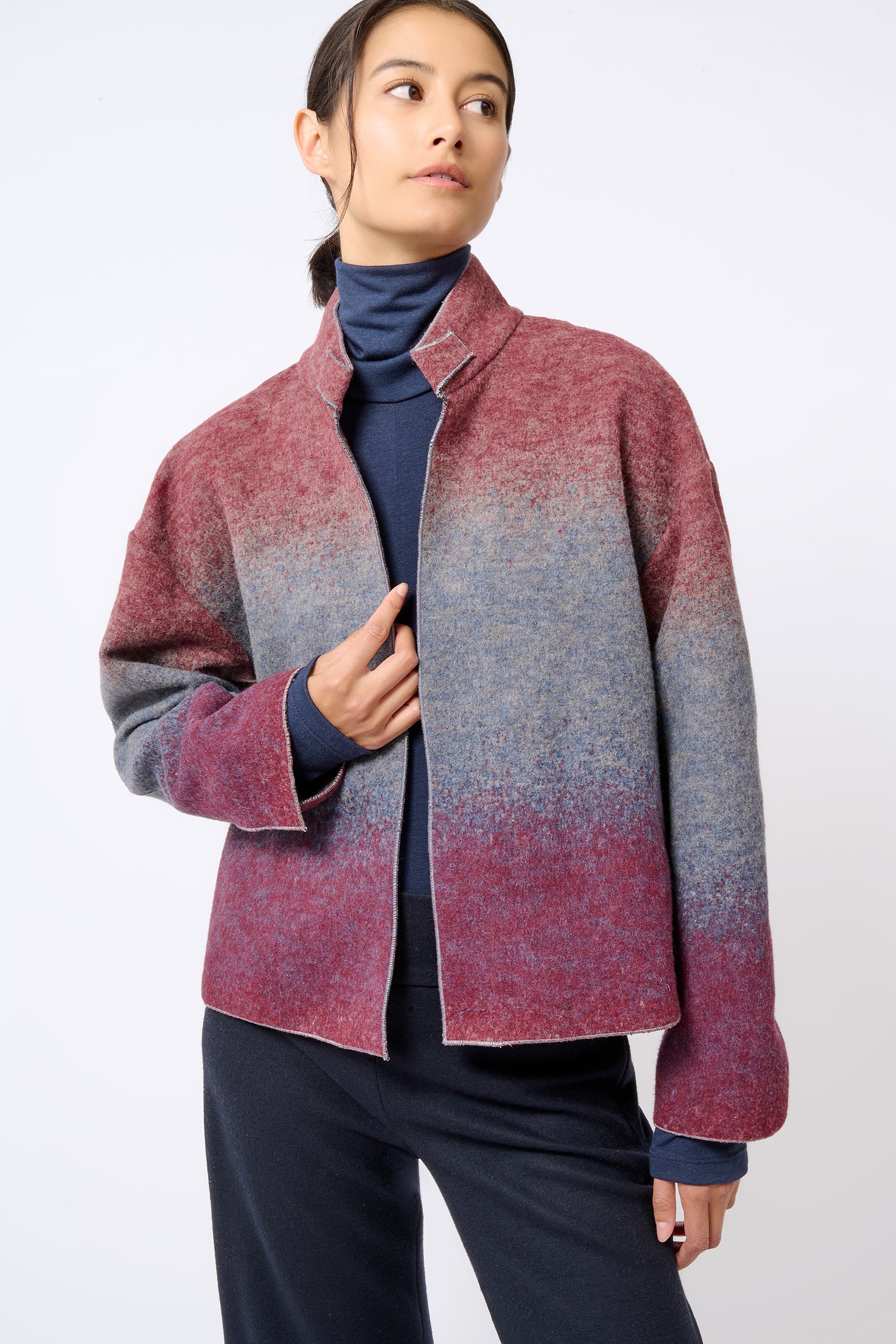 Kal Rieman Kasey Ombre Bomber in Ombre on Model with Hand on Zipper Front View
