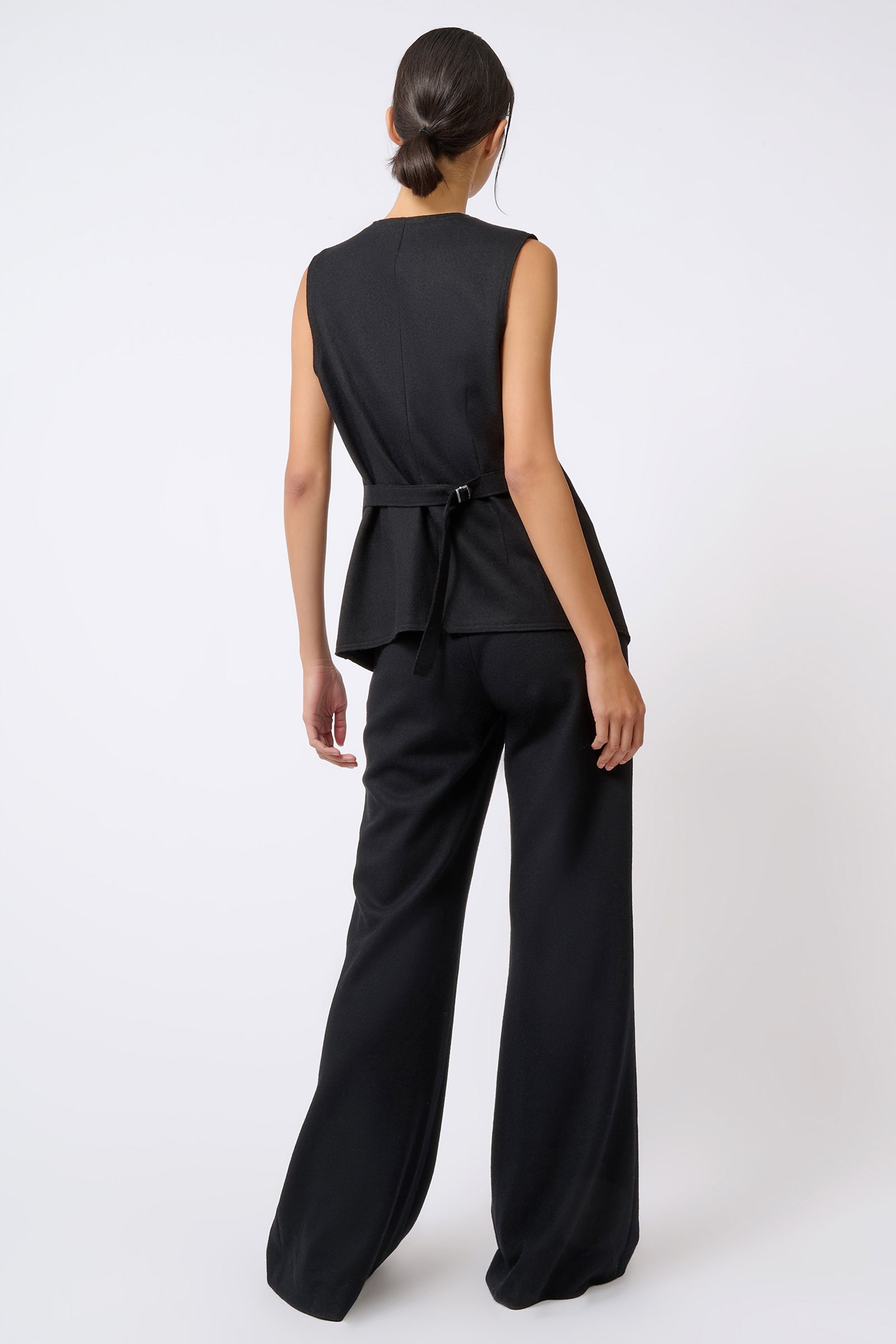 Kal Rieman Raw Edge Vest in Black on Model with Turtleneck Underneath Full Front View