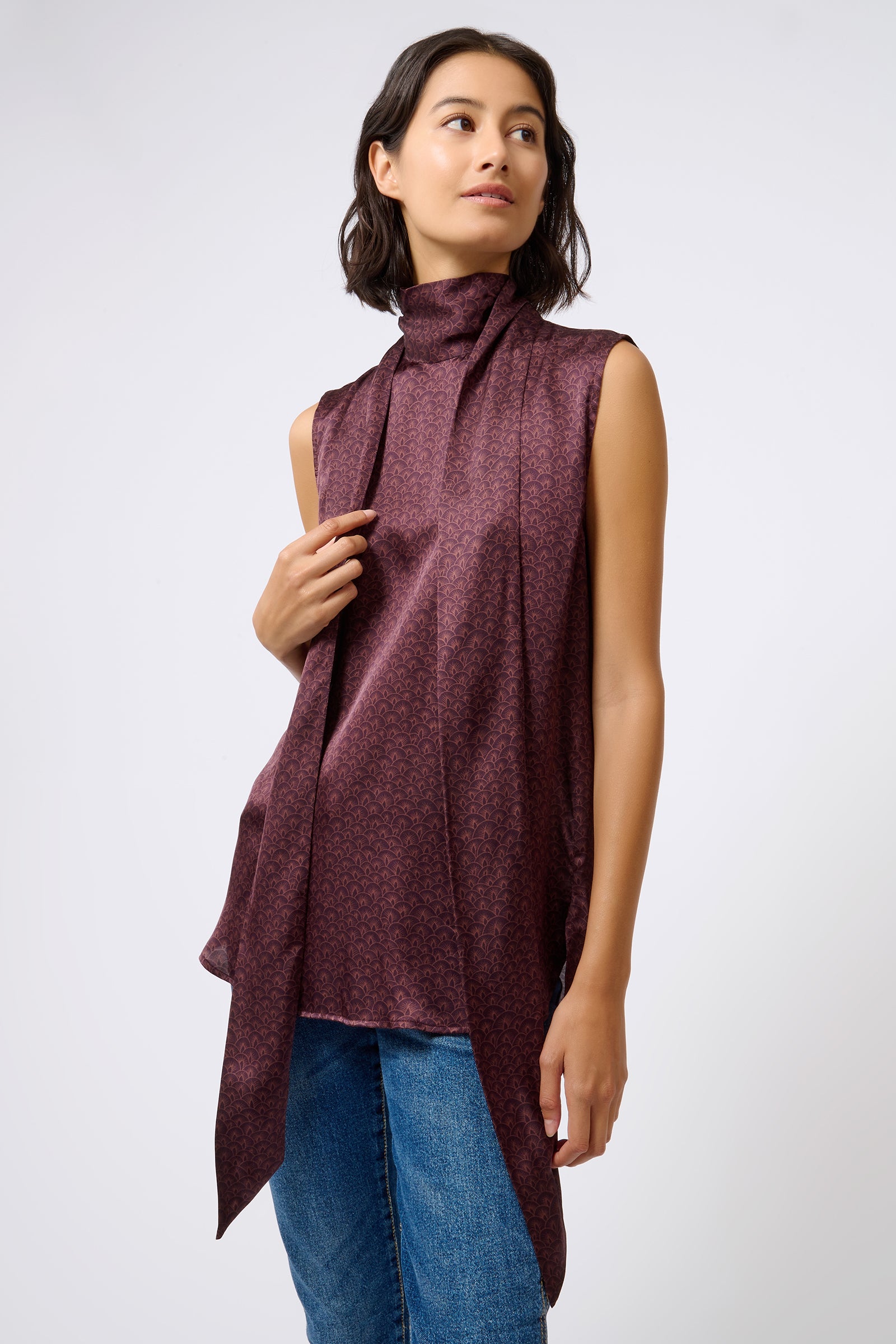 Kal Rieman Scarf Shell in Luna Bordeaux Print on Model with Hand on Scarf Front View