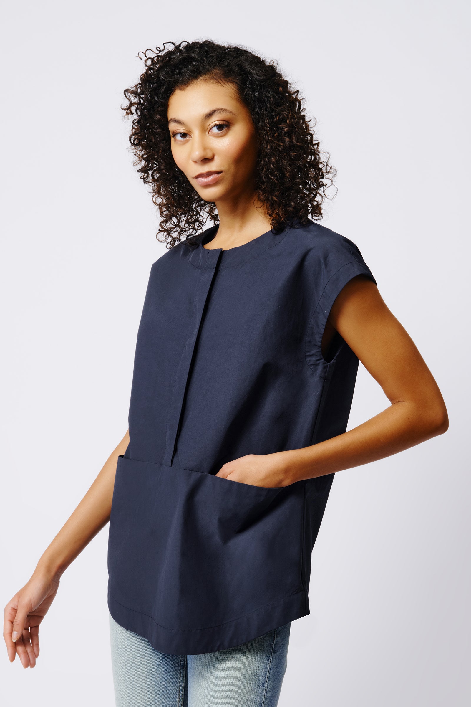 Kal Rieman Seam Pocket Tunic in Navy Broadcloth on Model Side View Crop 2
