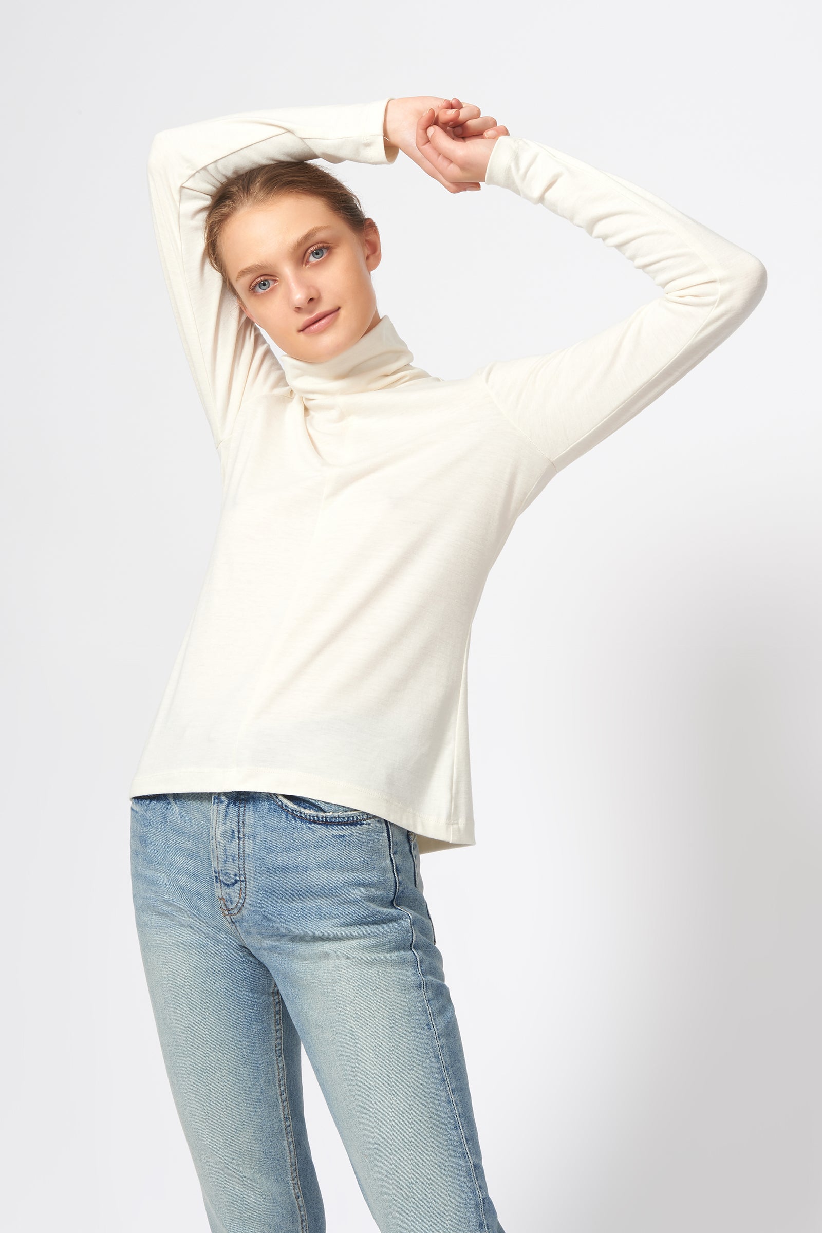 Kal Rieman Seamed Turtleneck in Ivory on Model Front View