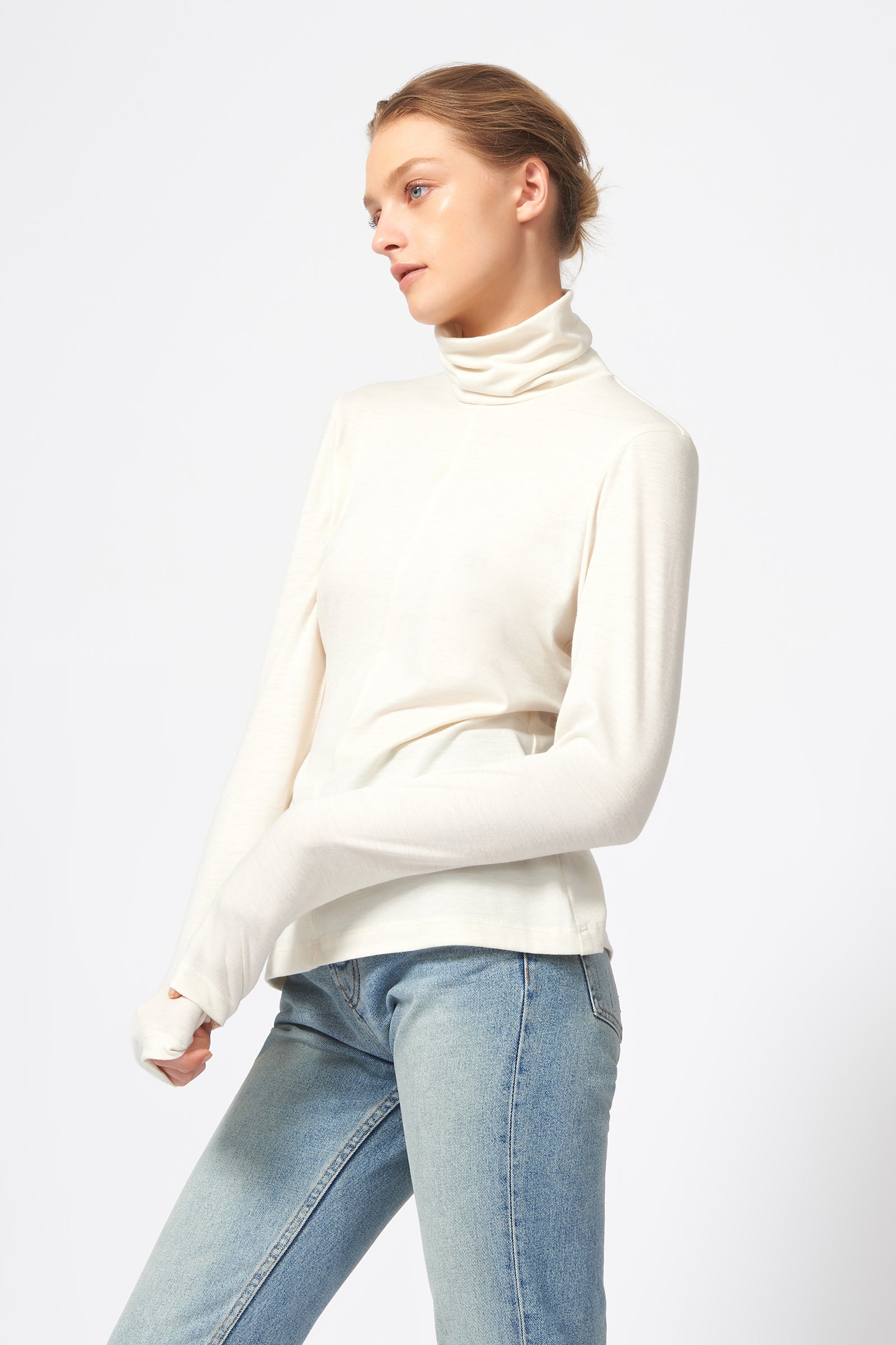 Kal Rieman Seamed Turtleneck in Ivory on Model Side View
