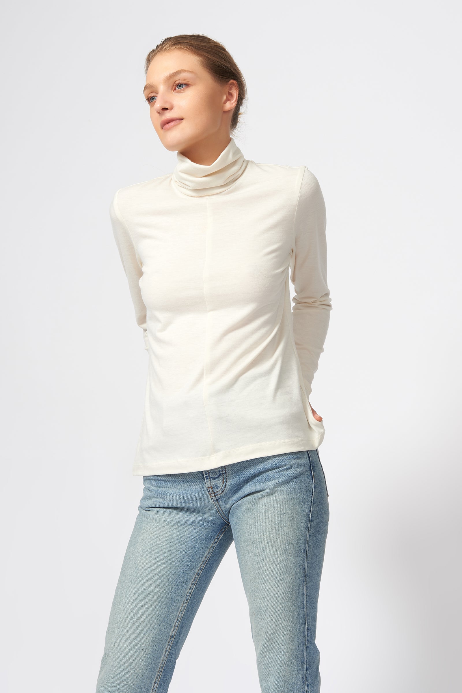 Kal Rieman Seamed Turtleneck in Ivory on Model Front View