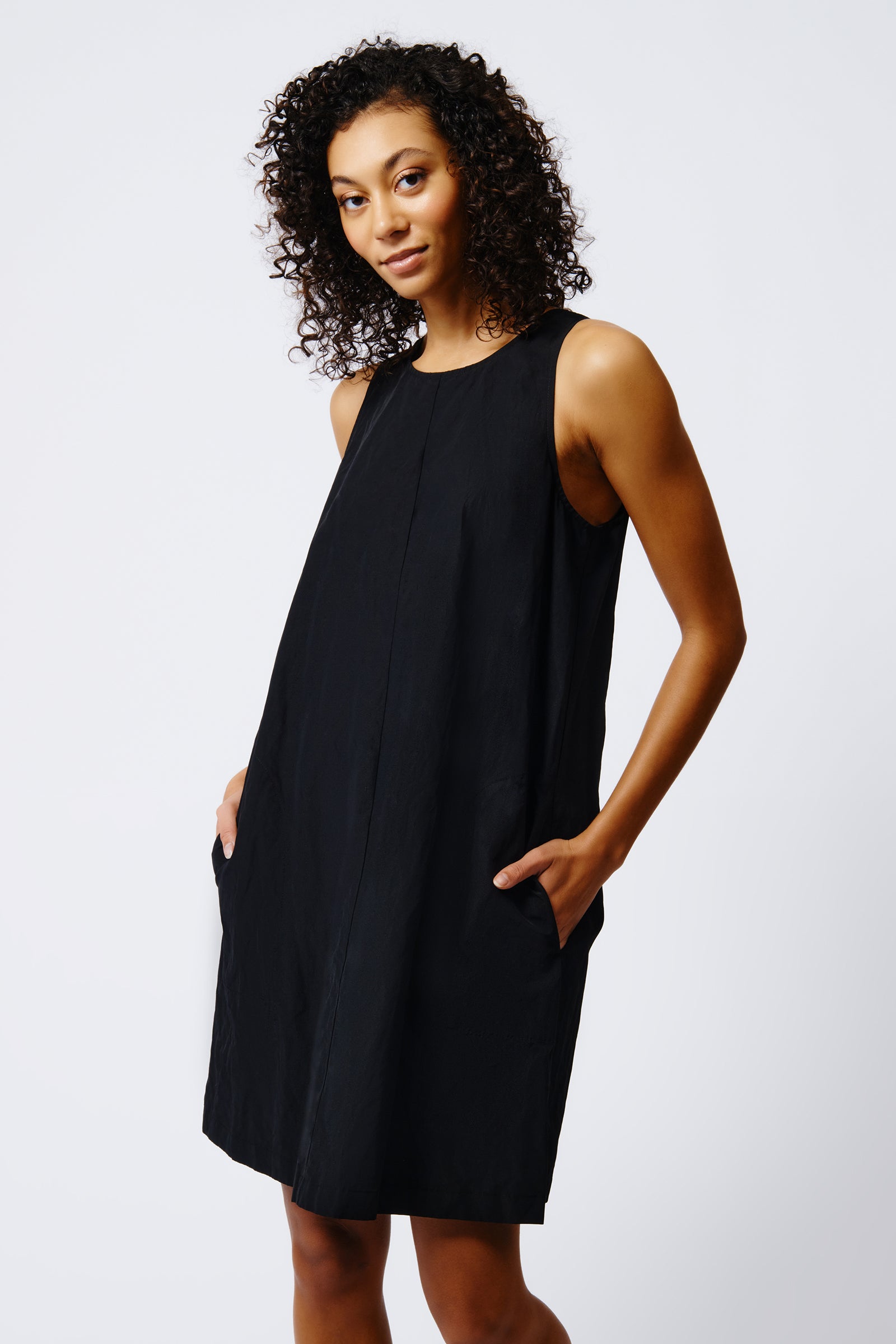 kal rieman trapeze dress in black on model front view crop