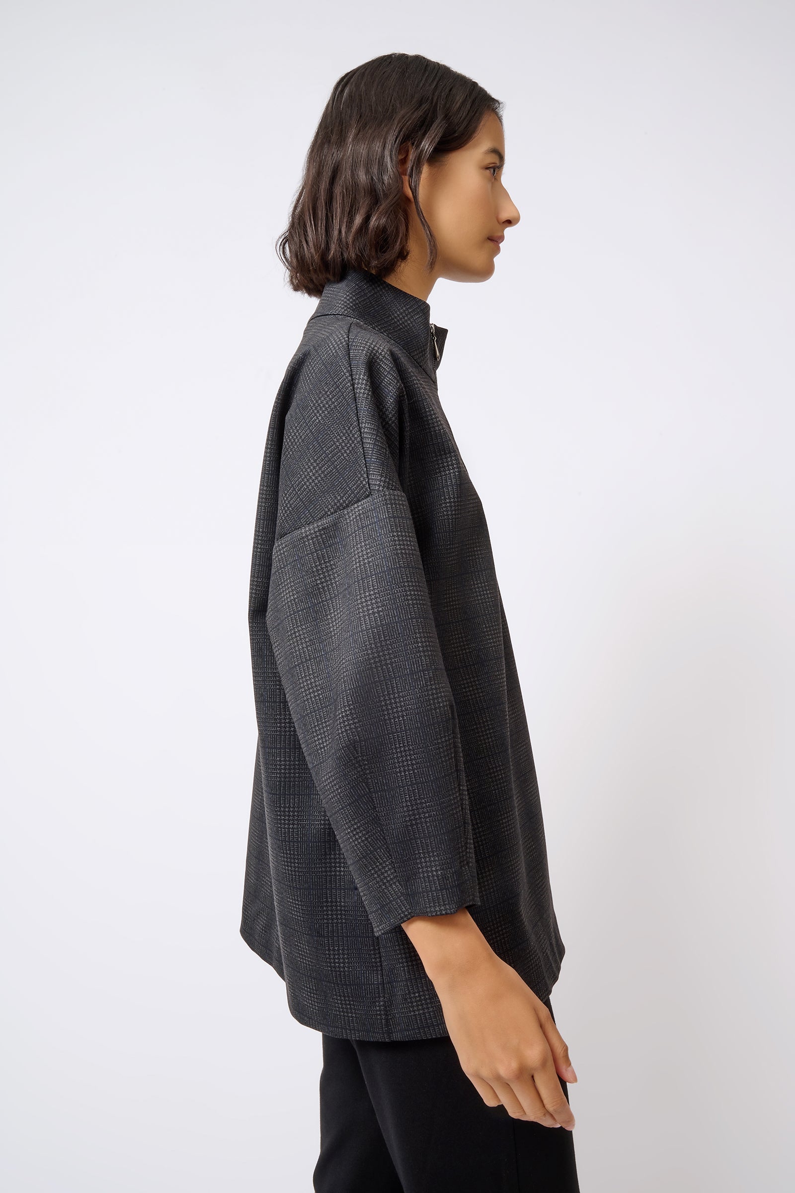Kal Rieman Zip Mock Top in Black Plaid on Model Side View