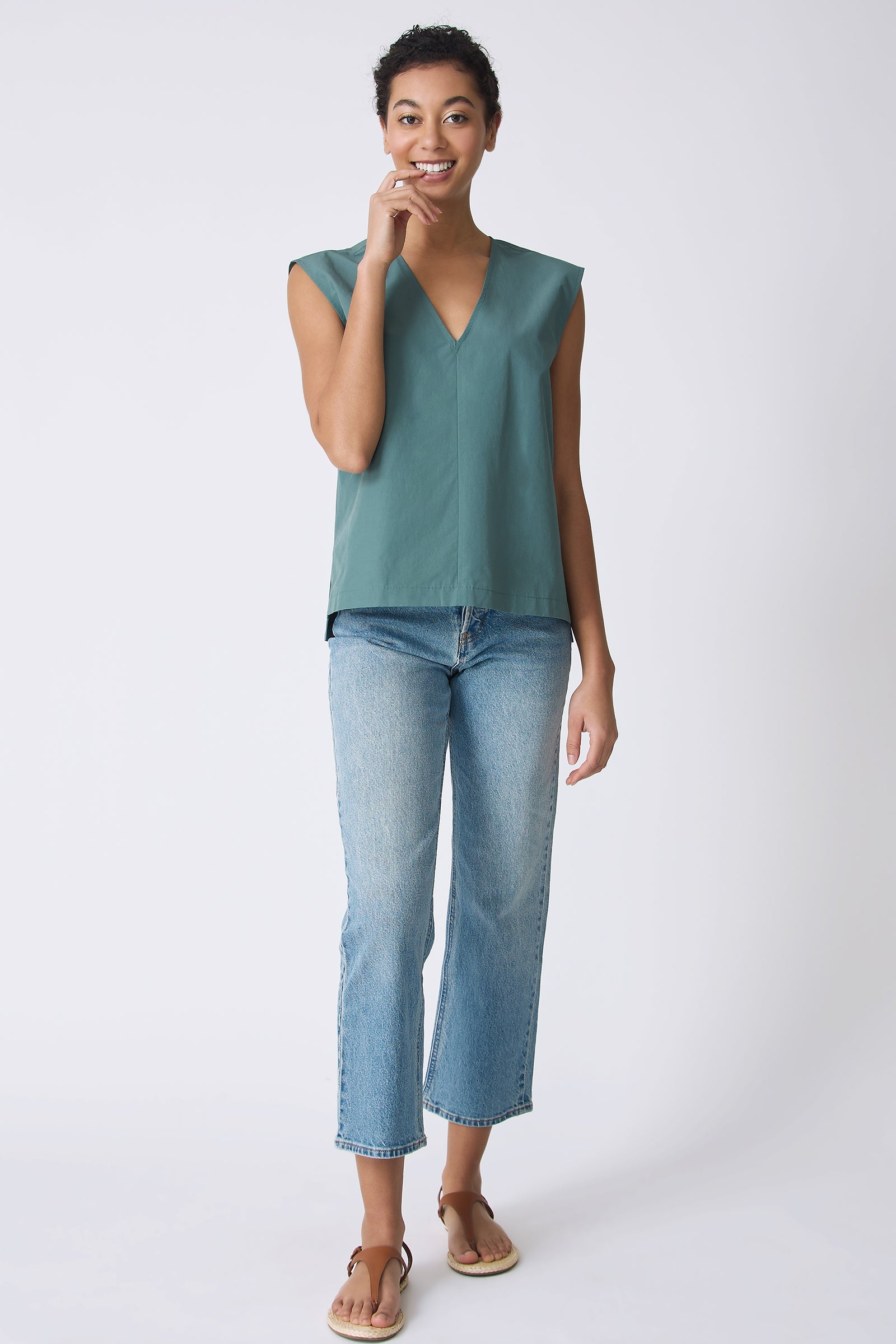 Ava V-Neck Shell Top in Sage on model smiling full front view