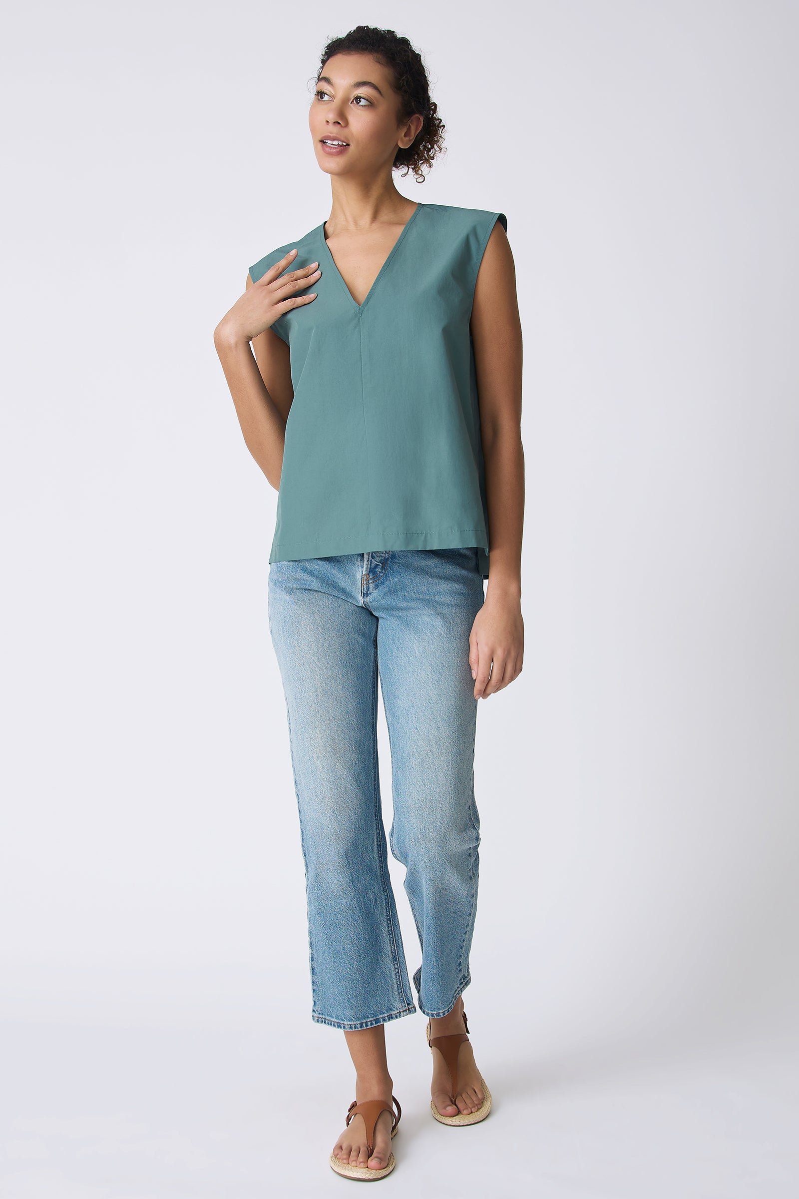 Ava V-Neck Shell Top in Sage on model looking right full front view