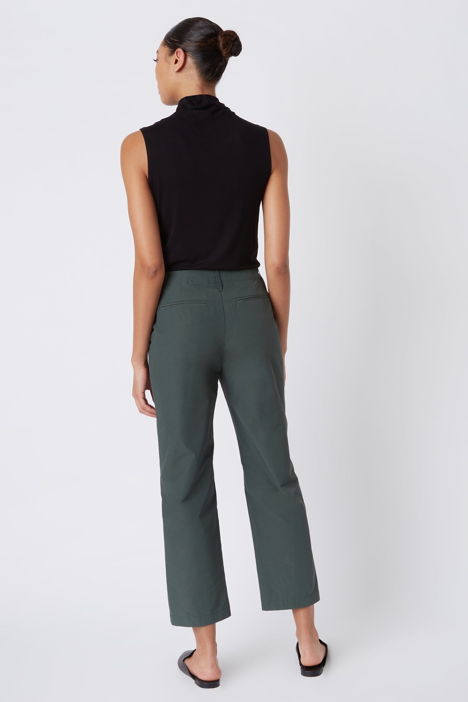 Kal Rieman Francoise Cigarette Pant in Loden Italian Broadcloth on Model with Hand on Neck Full Front View