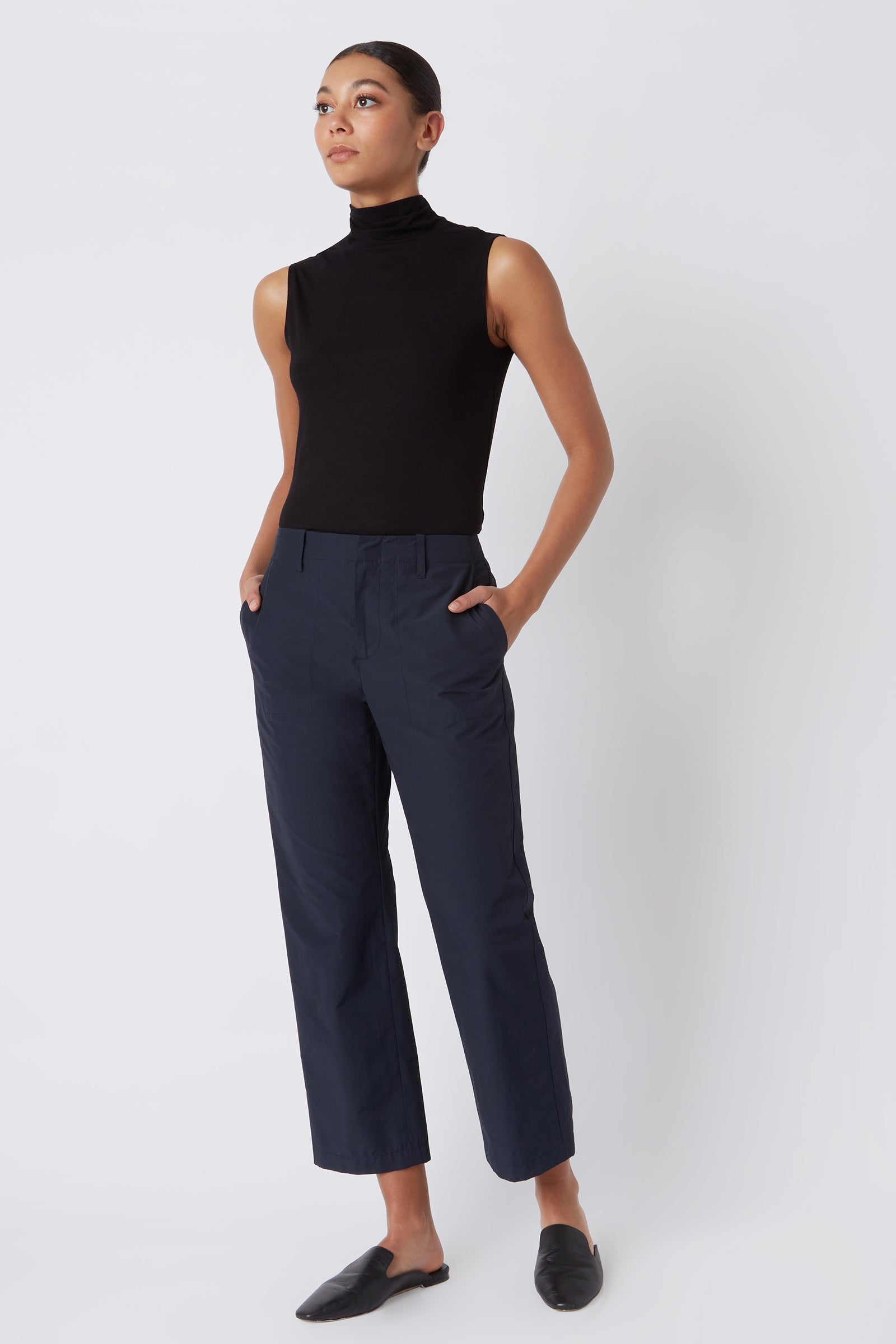Kal Rieman Francoise Cigarette Pant in Navy Italian Broadcloth on Model with Hands in Pockets Full Front Side View