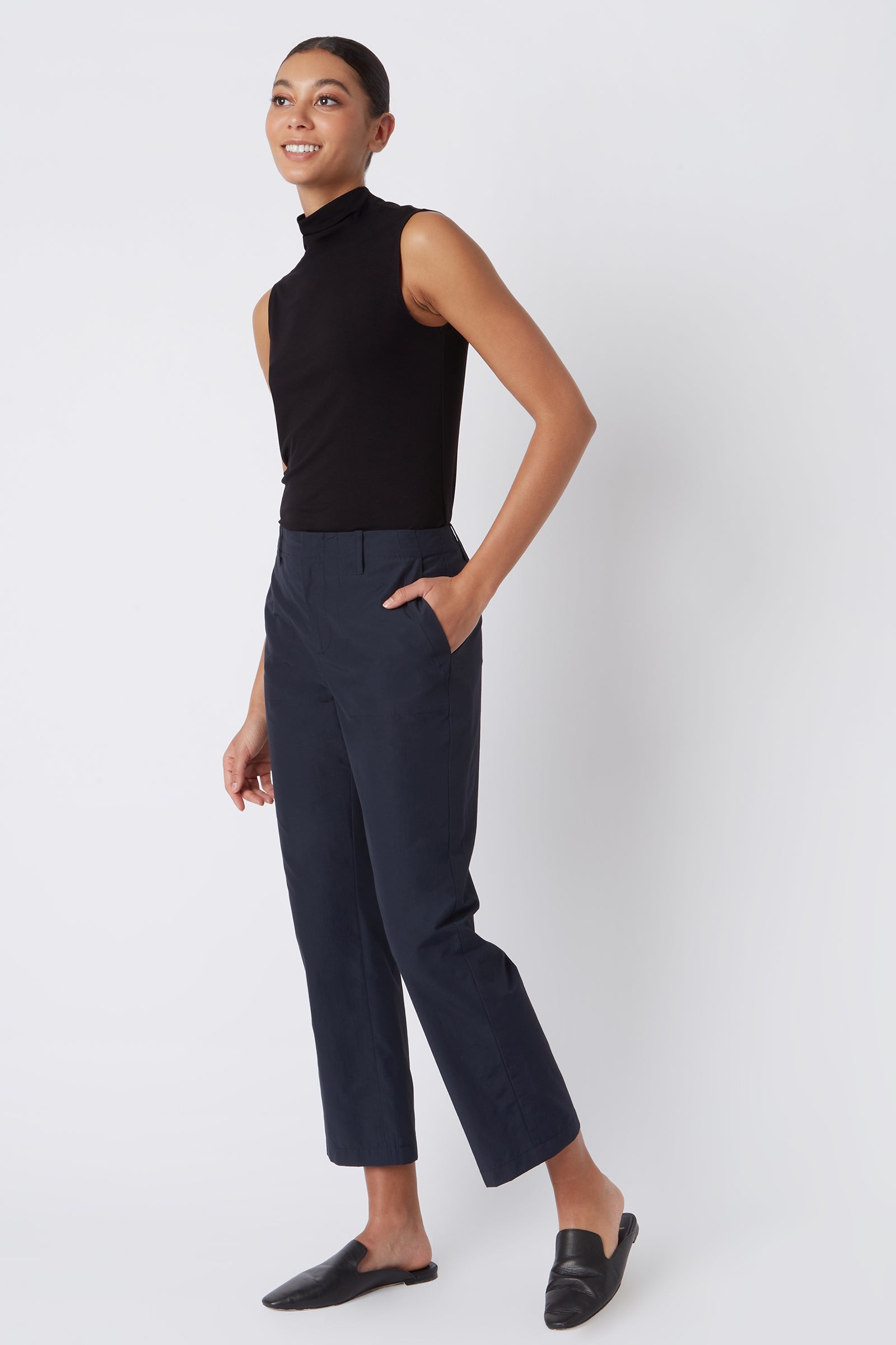 Kal Rieman Francoise Cigarette Pant in Navy Italian Broadcloth on Model with Hand in Pocket Full Side View