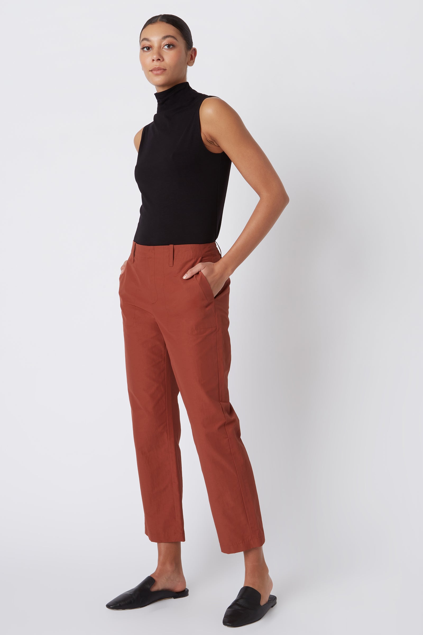 Kal Rieman Francoise Cigarette Pant in Rust Italian Broadcloth on Model with Hands in Pockets Full Front Side View