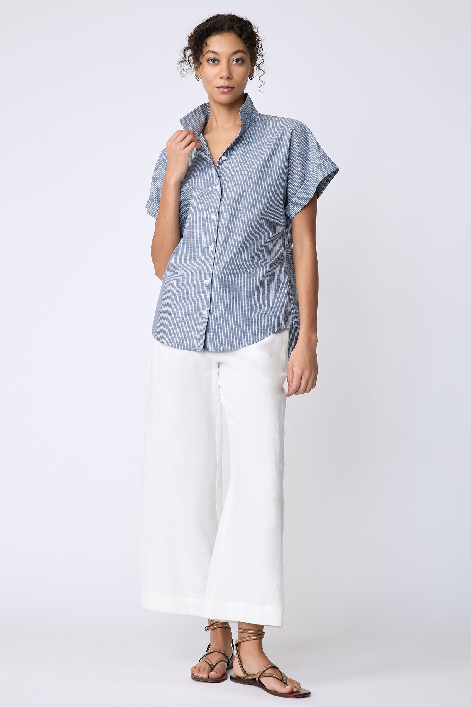 Kal Rieman Ali Kimono Shirt in mini stripe dark indigo on model side front view full holding collar