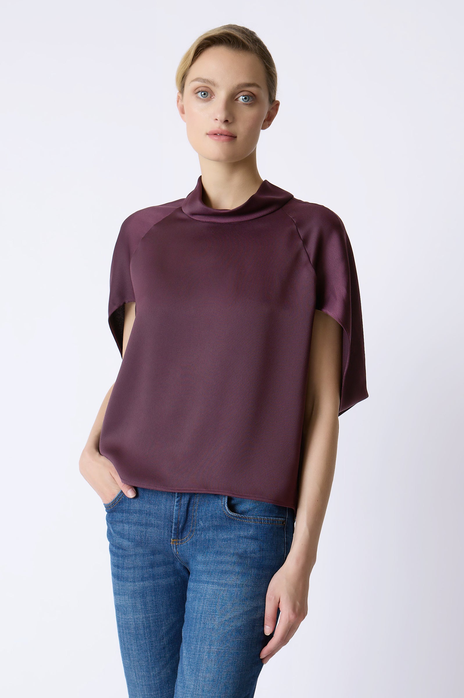 Kal Rieman Angelica Cape Top in Bordeaux on model with right hand in pocket front view