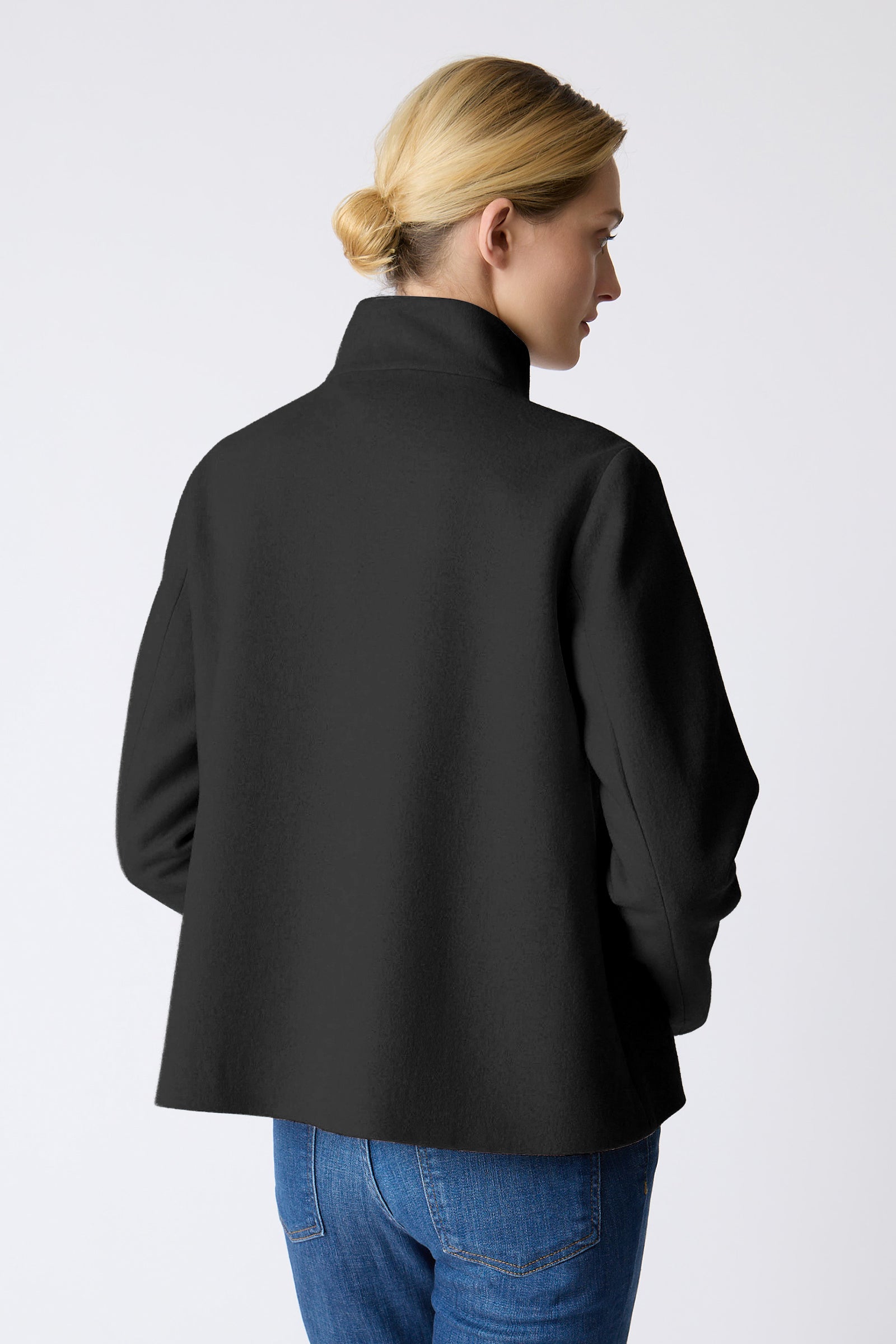 Kal Rieman Bristol Swing Jacket in black on model with left hand in pocket full front view