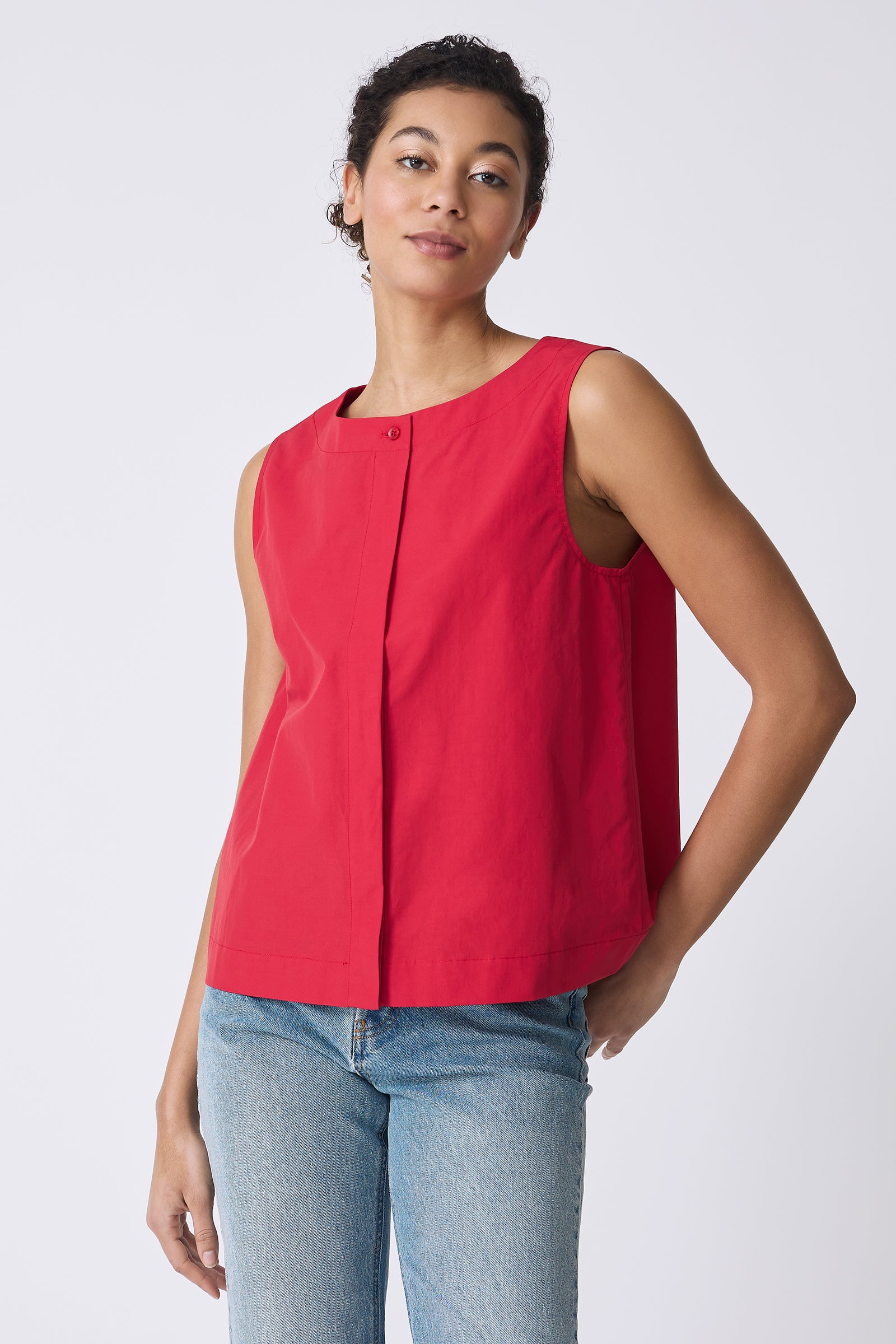 Kal Rieman Colette Shell Top in Red on model with arm behind back front view