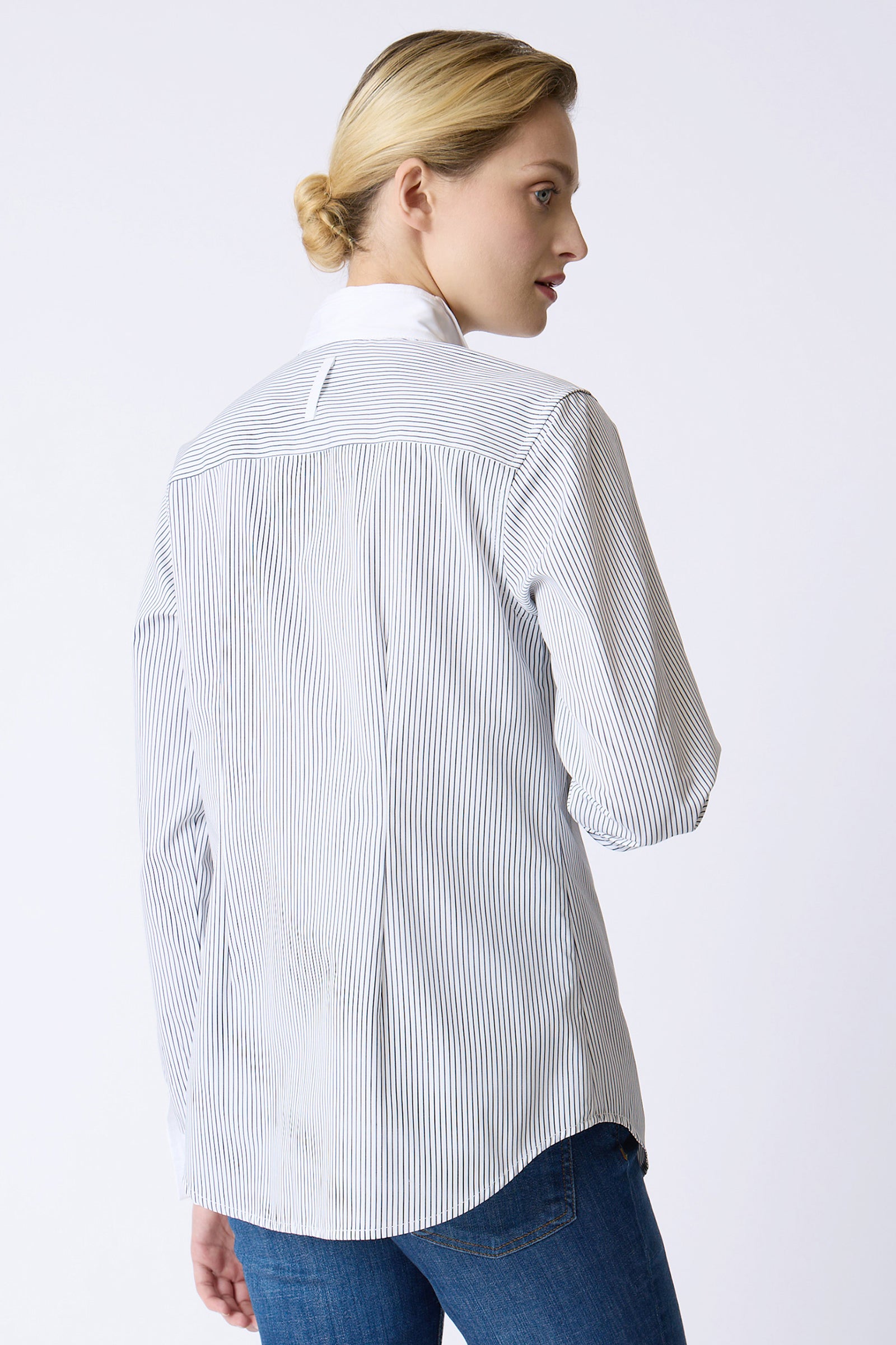 Kal Rieman Double Collar Shirt in Chain Stripe on model with hands in pockets front view