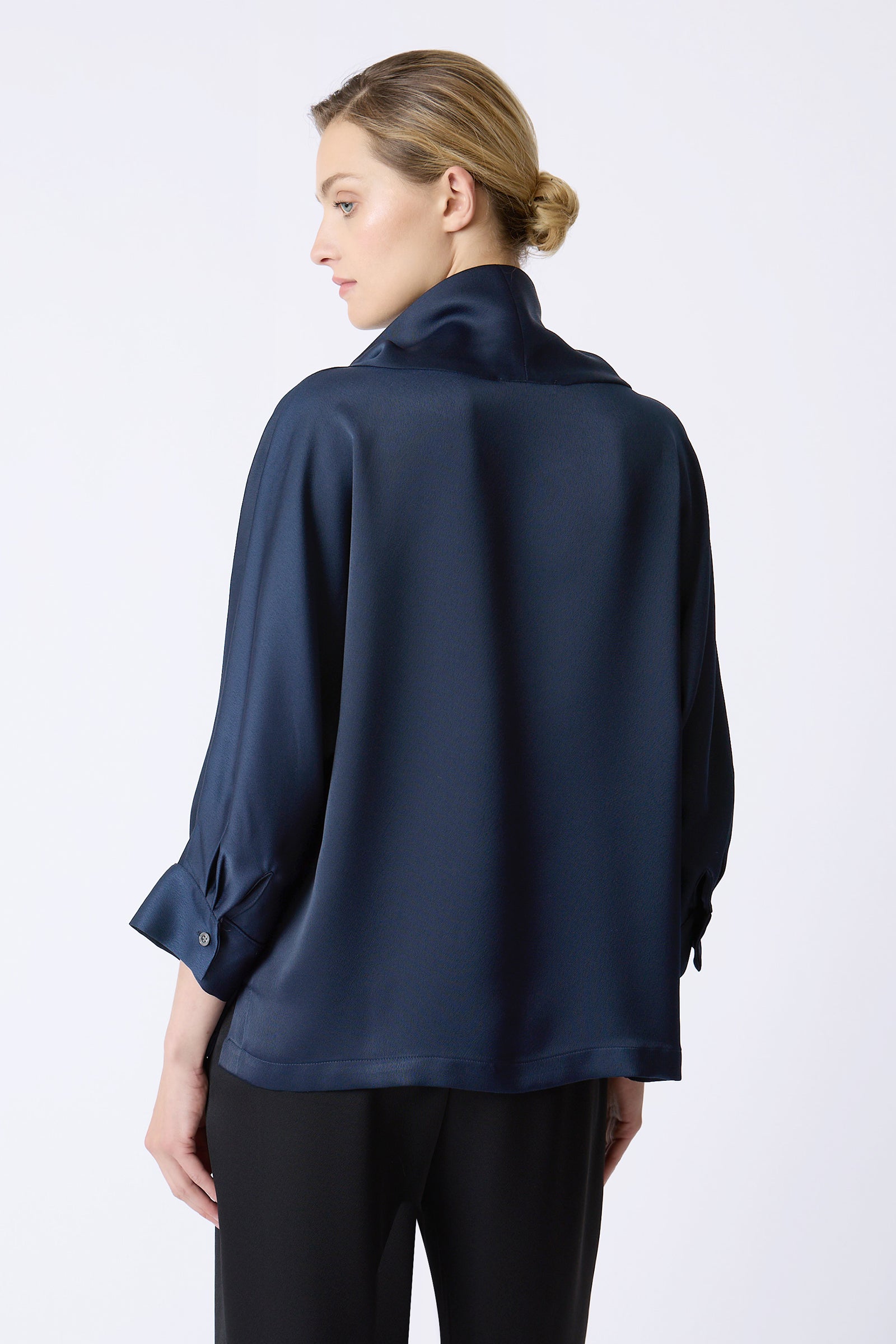 Kal Rieman Ellie Satin Tneck in Navy on model touching collar front view