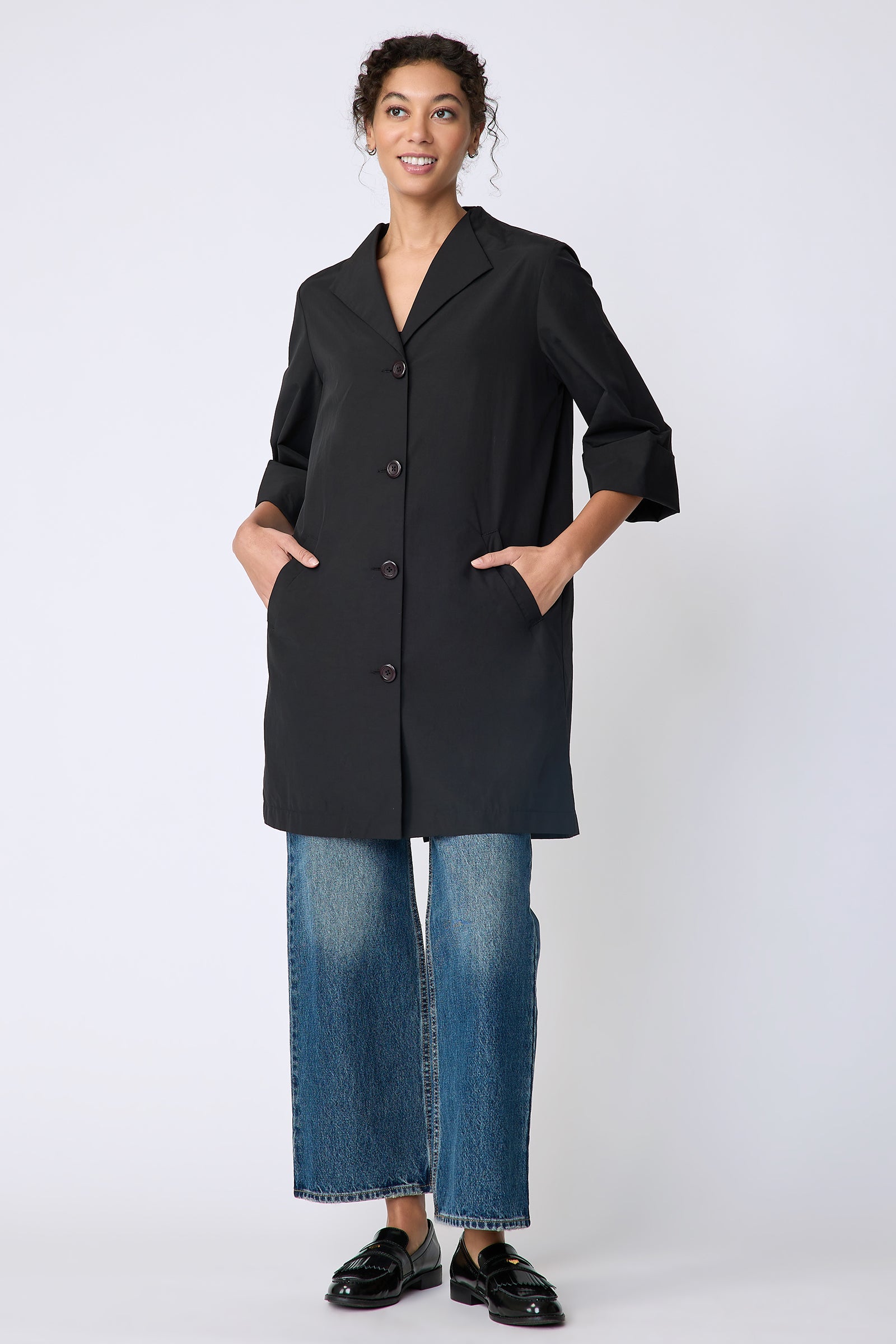 Kal Rieman Else Peacoat in Italian Broadcloth black on model front full length hands in pockets