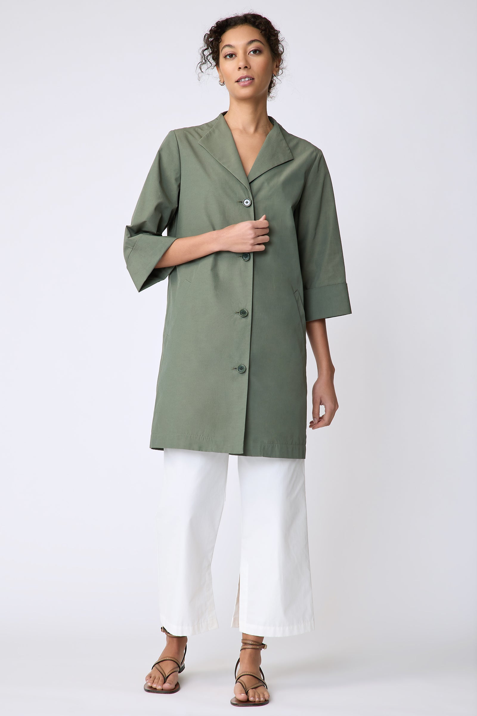 Kal Rieman Else Peacoat in Italian Broadcloth cactus on model front view full length holding front of jacket