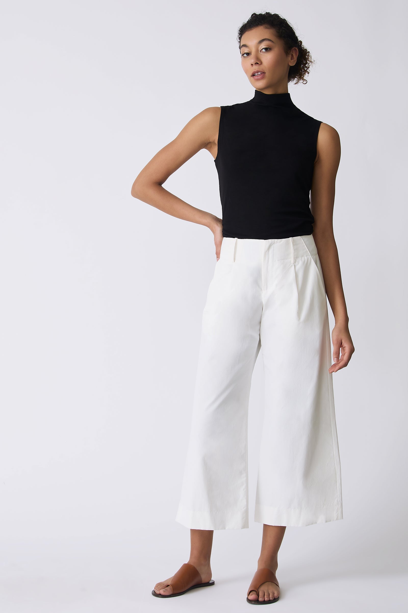 Kal Rieman Gabby Crop Pant in Ecru on model with hand on hip full front view