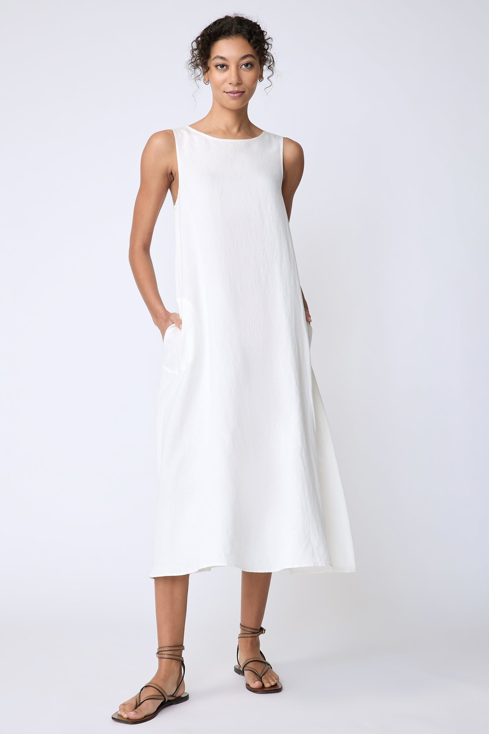 Kal Rieman Georgina Dress in Cotton Linen Ivory on model front view hands in pockets