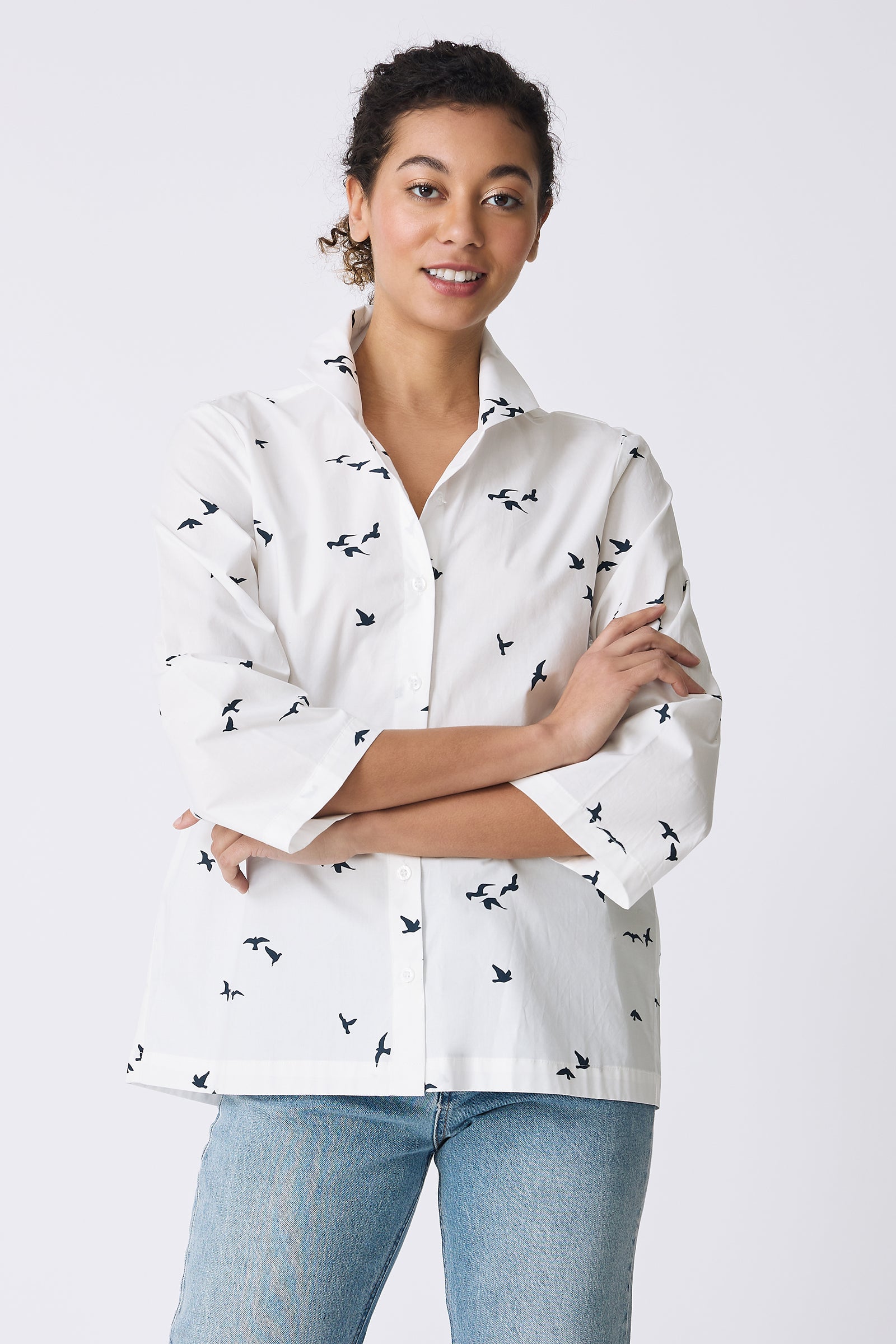 Kal Rieman 3/4 Sleeve Ginna Shirt in White Bird Print on model with arms crossed front view