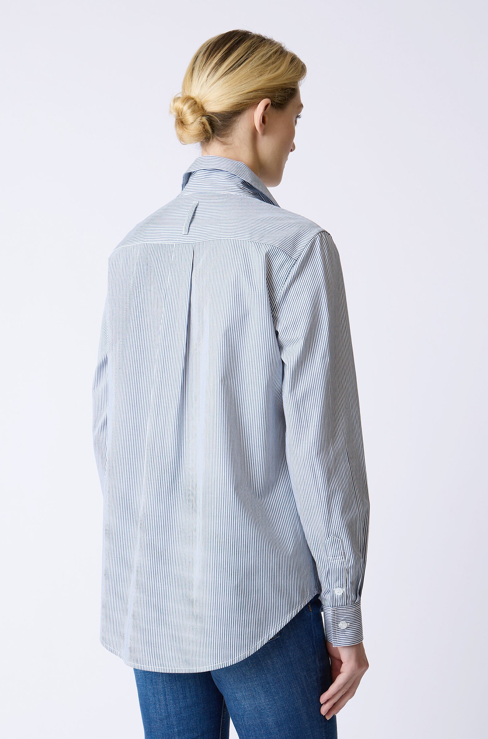 Kal Rieman Ginna Box Pleat Shirt in Mini Denim Stripe on model front view