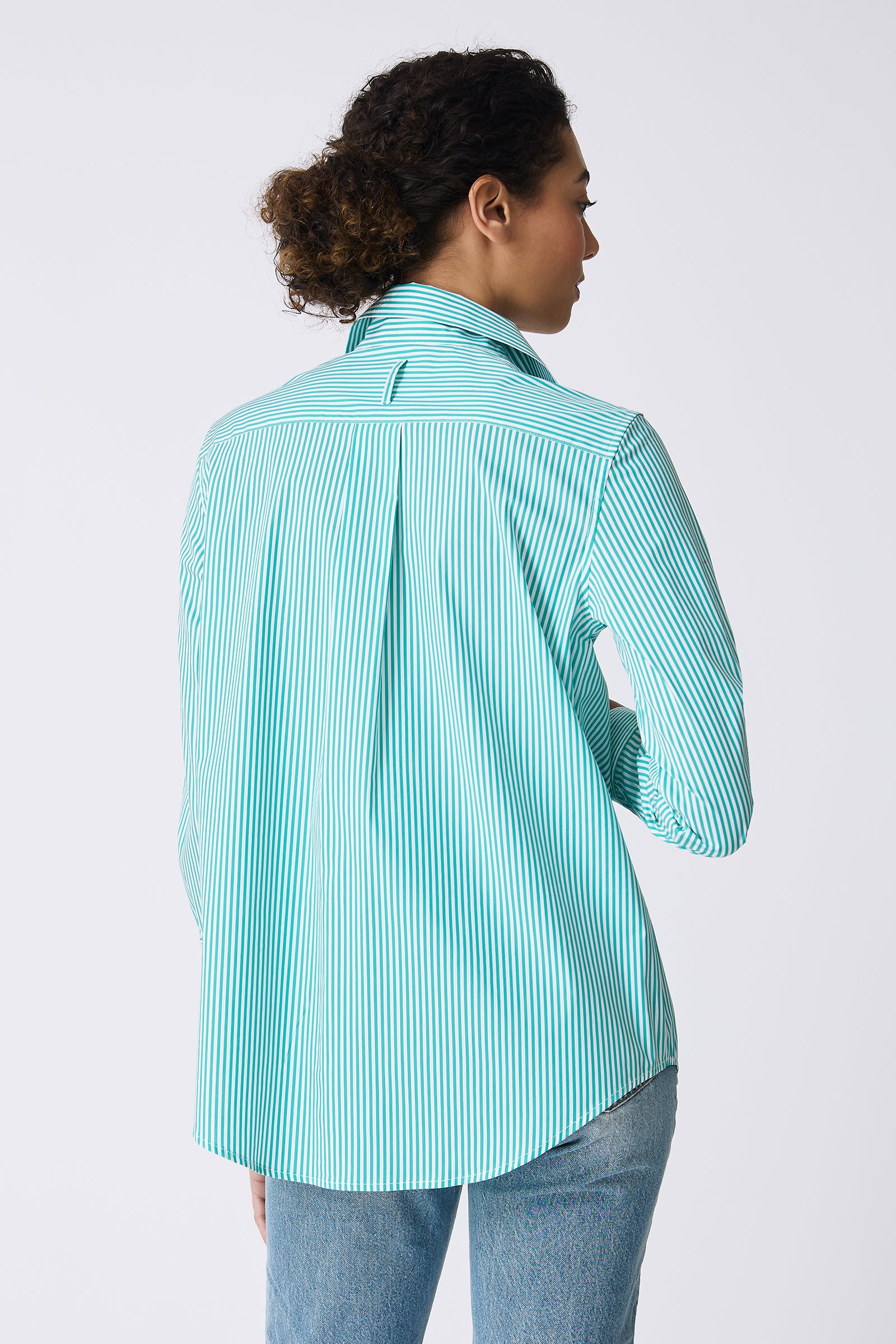 Kal Rieman image of the Ginna Box Pleat Shirt in Miami Stripe Green on model back view