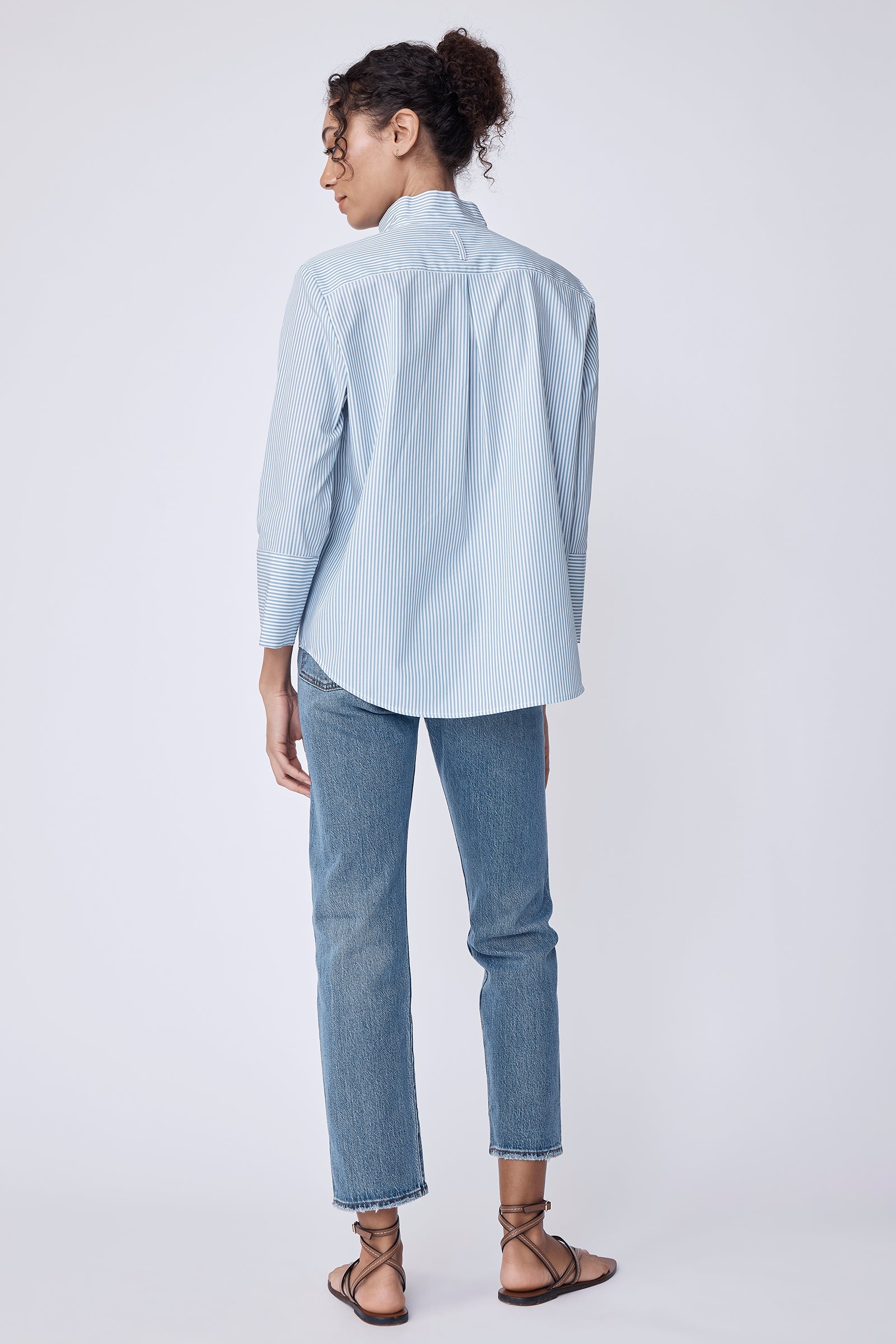 Kal Rieman Greta Placket Shirt in saltwater cotton stripe on model side view detailed shot
