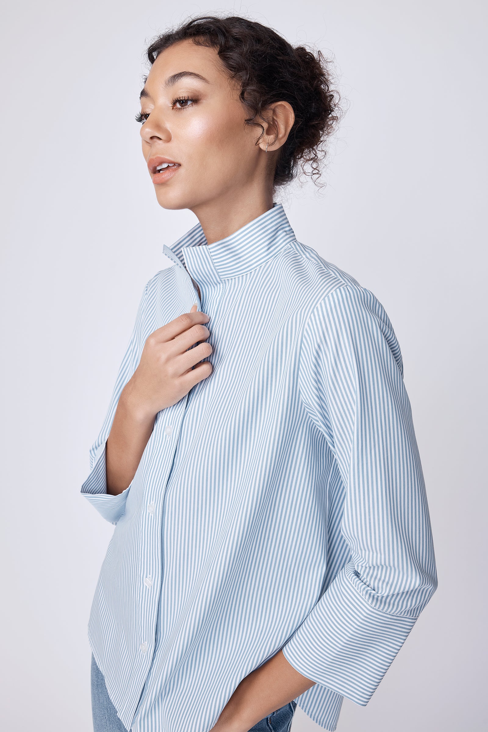 Kal Rieman Greta Placket Shirt in saltwater cotton stripe on model side view detailed shot