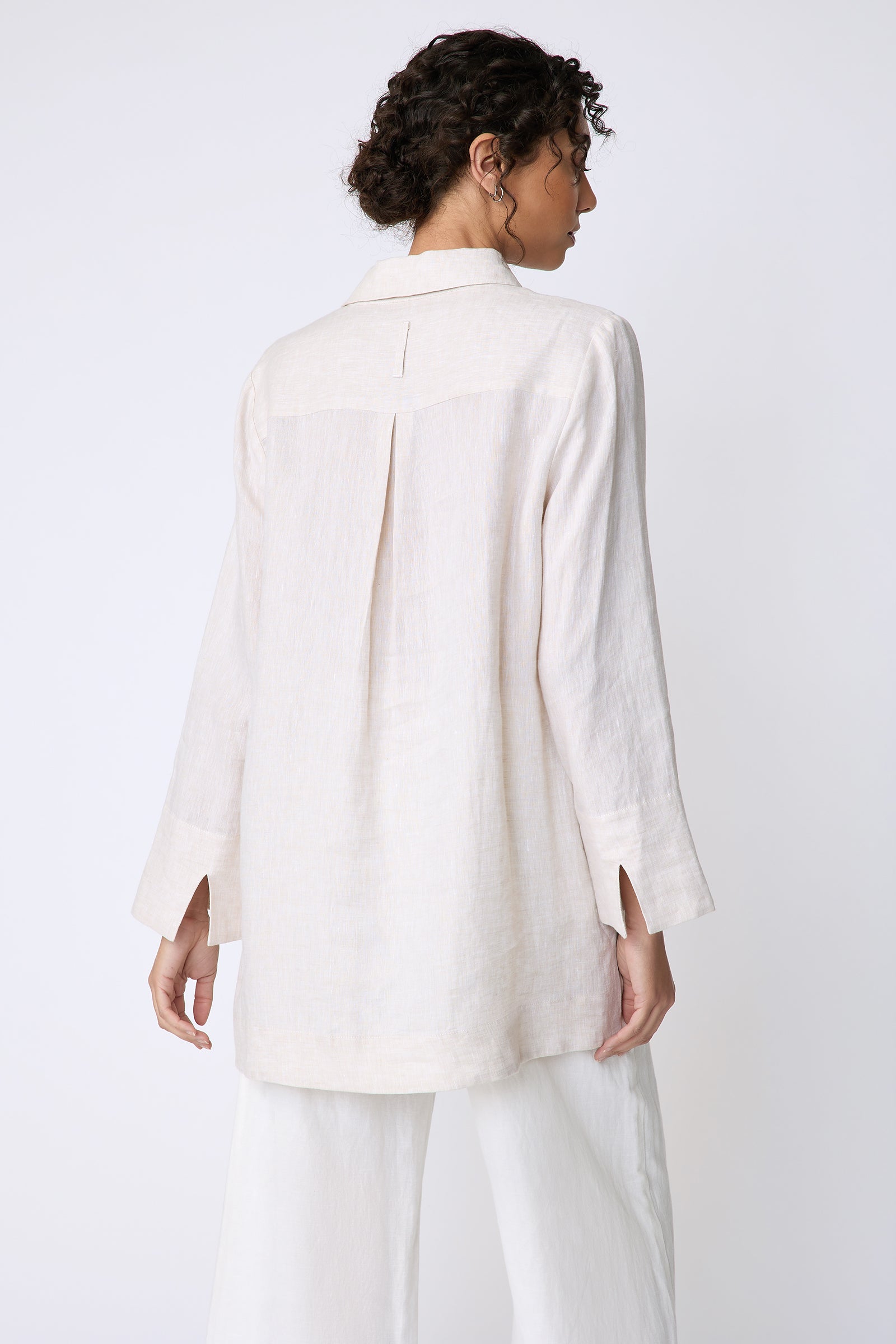 Kal Rieman Inez Placket Tunic in linen color sand on front view full length hands in front