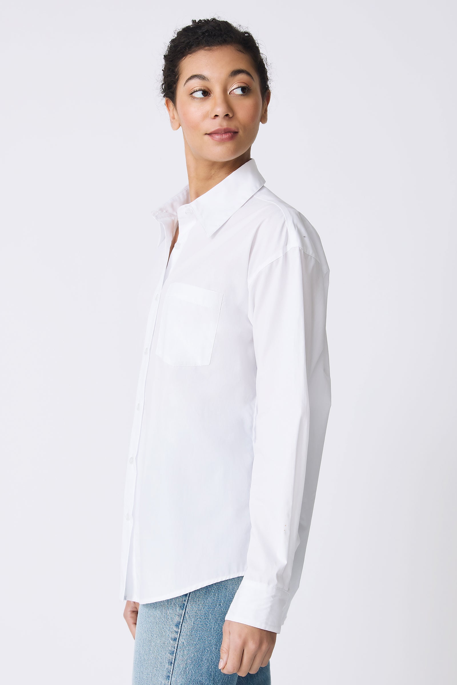 Kal Rieman Joni Boyfriend Shirt in White Poplin on model looking over shoulder side view