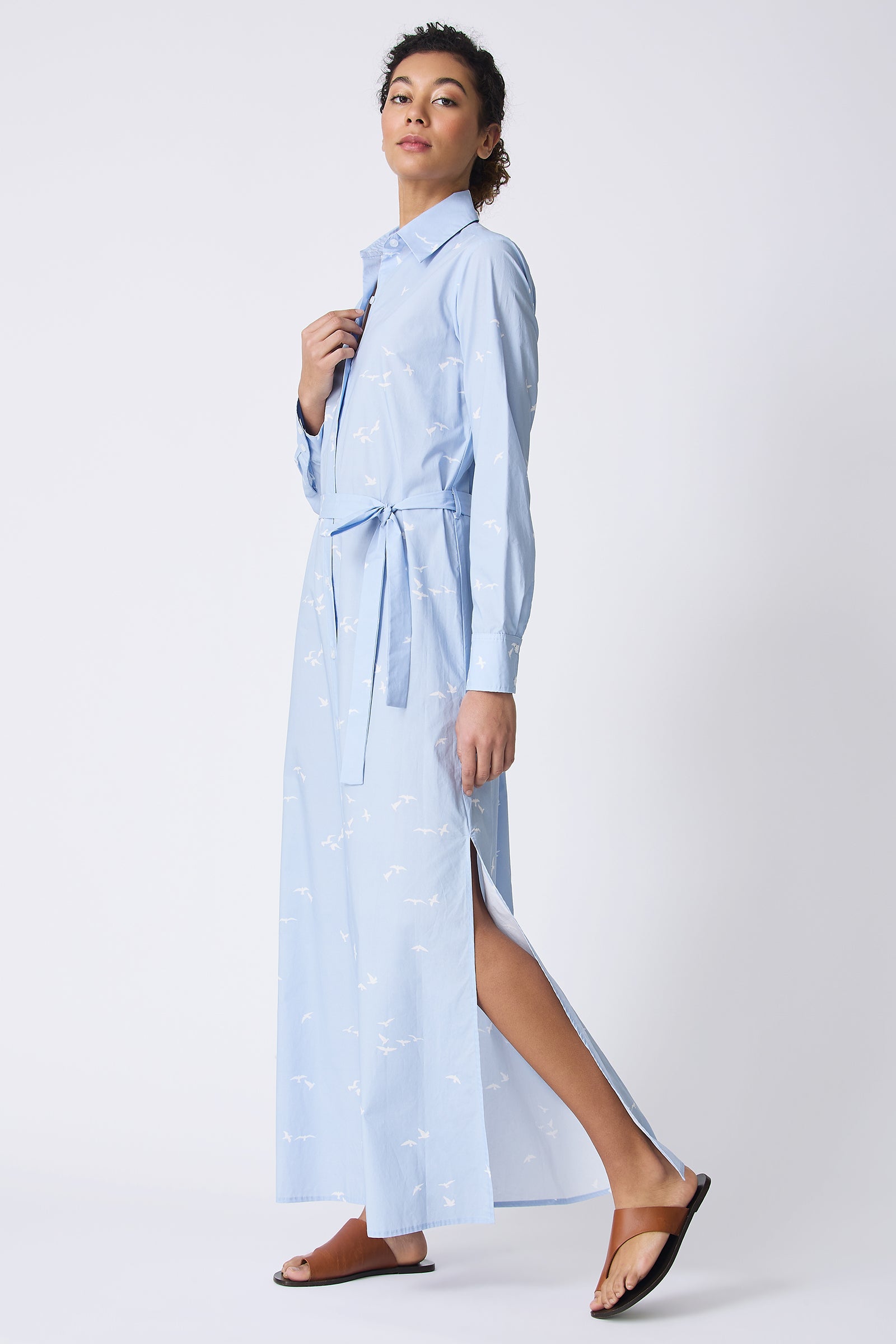 Kal Rieman June Maxi Dress in Oxford Blue Bird Print on model walking full side view