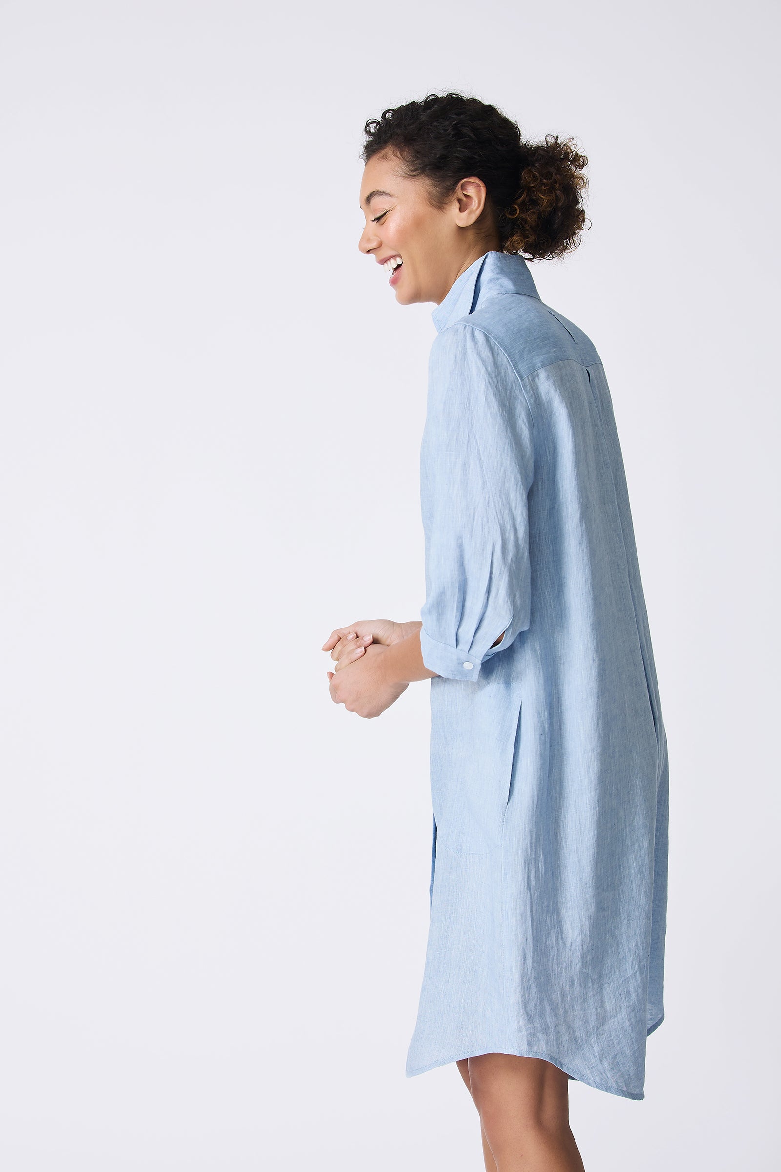 Kal Rieman Katie Shirt Dress in Sky Blue on model laughing side view