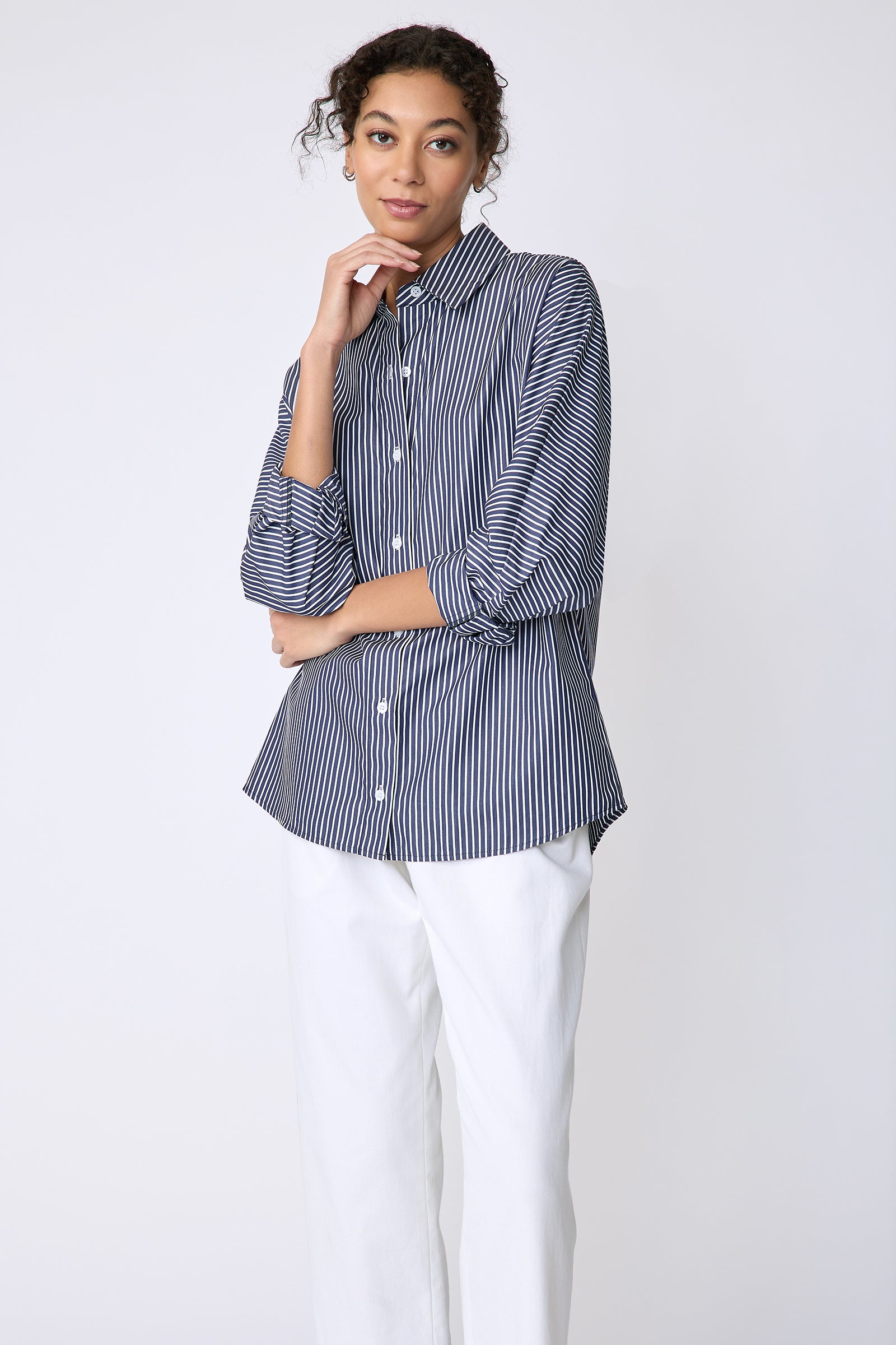 Kal Rieman Lauren Blouse in savoy stripe on model front view hand at face