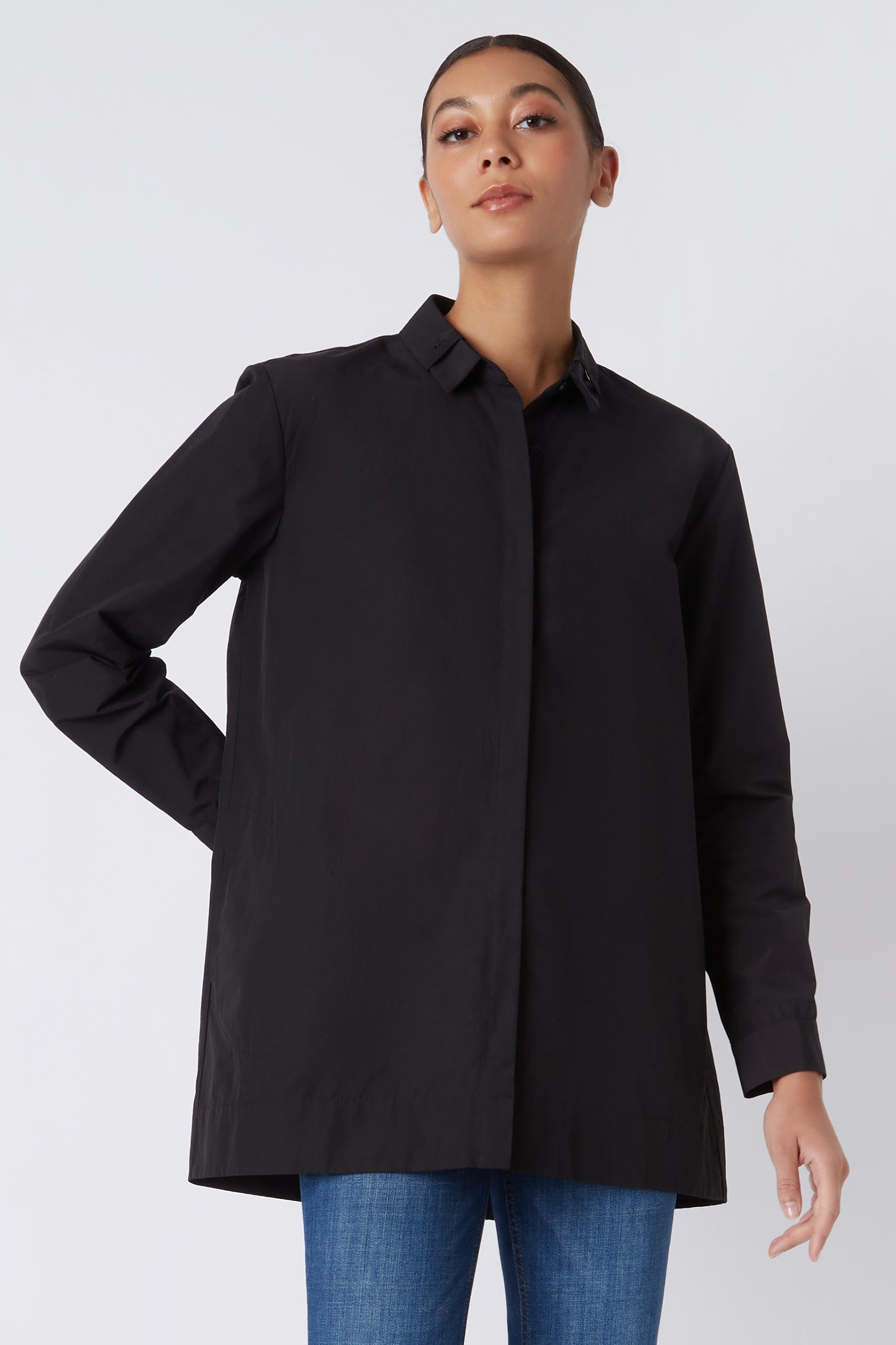 Kal Rieman Lori Tab Collar Tunic in Black on Model with Hand Behind Back Cropped Front View