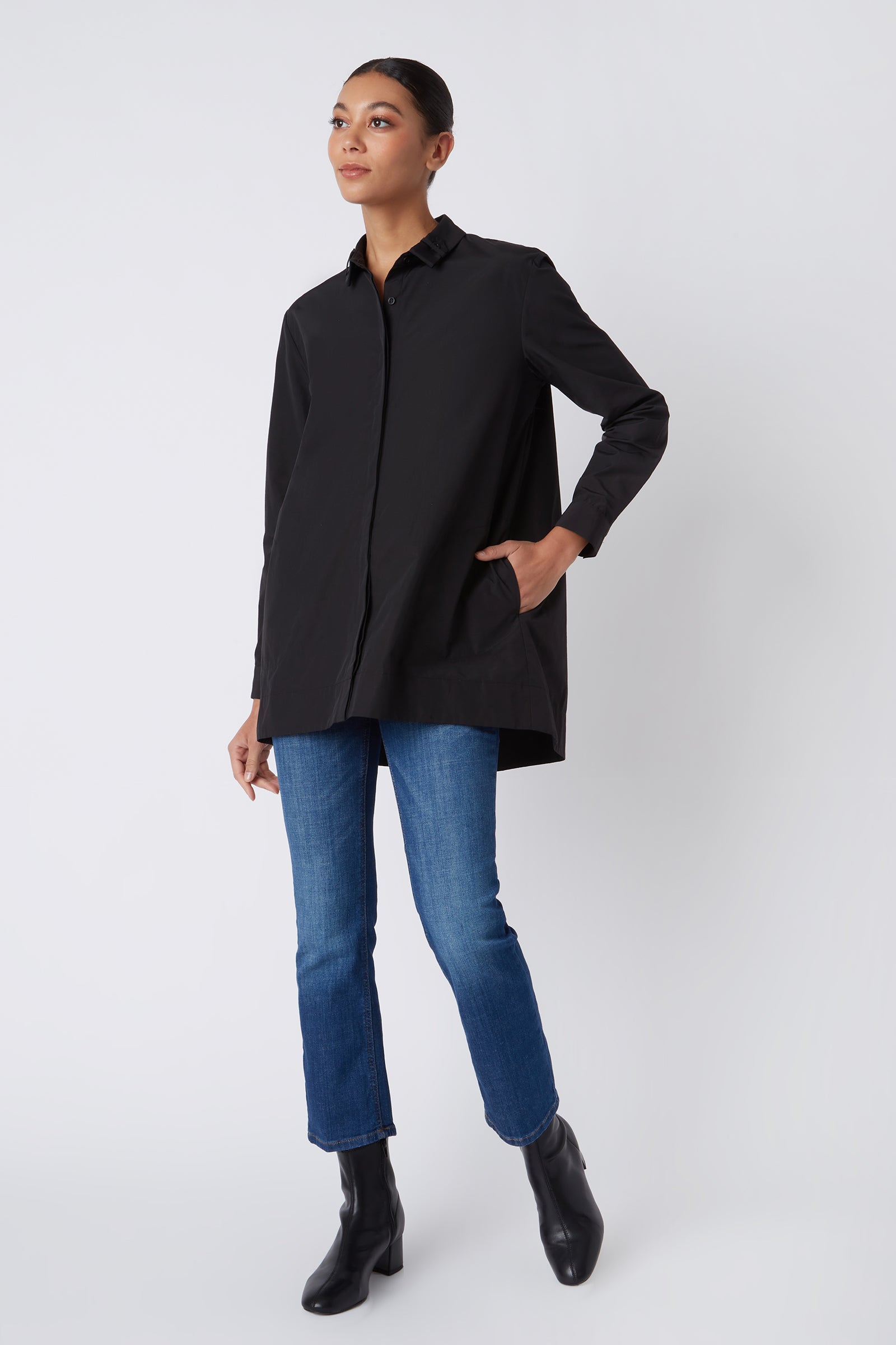 Kal Rieman Lori Tab Collar Tunic in Black on Model with Hand in Pocket Walking Full Front View